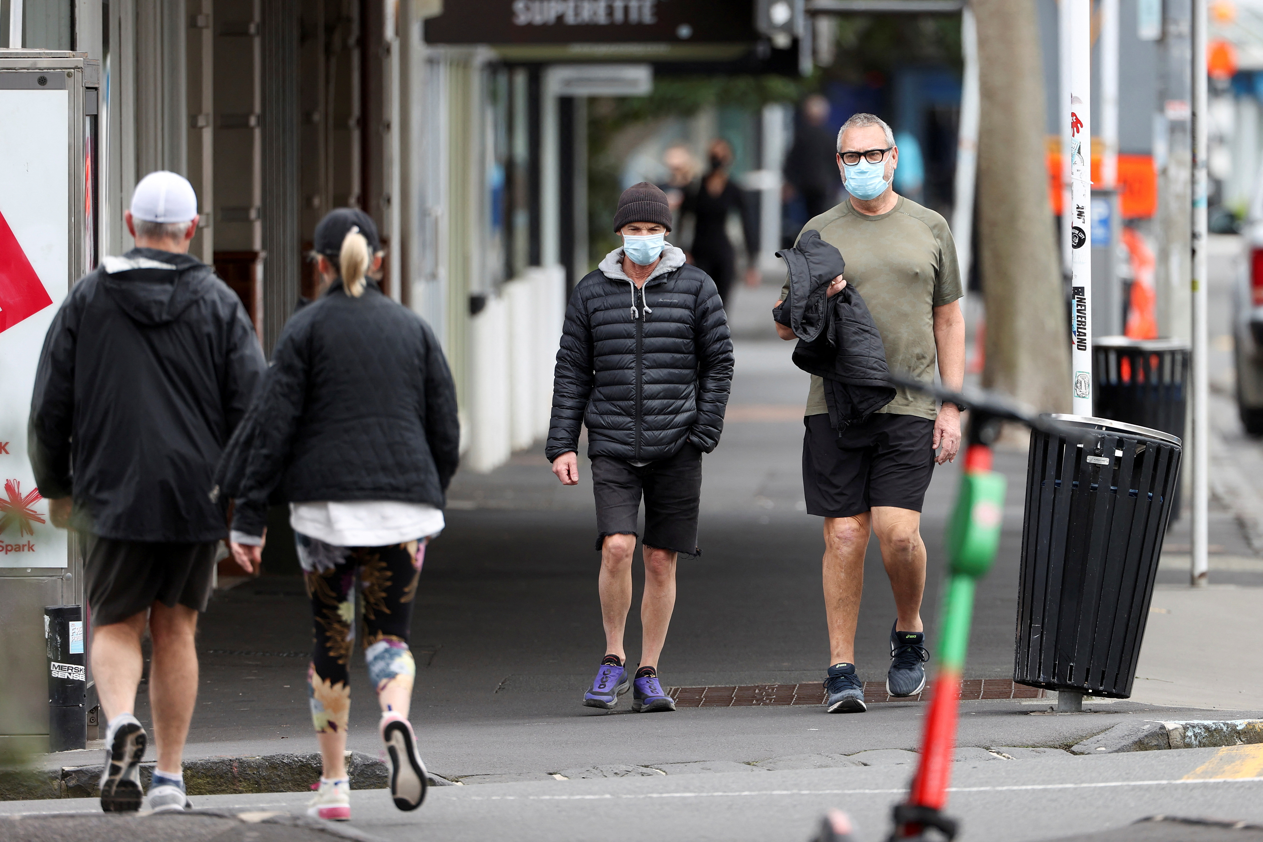 New Zealand announces free masks, tests as health system struggles with Covid