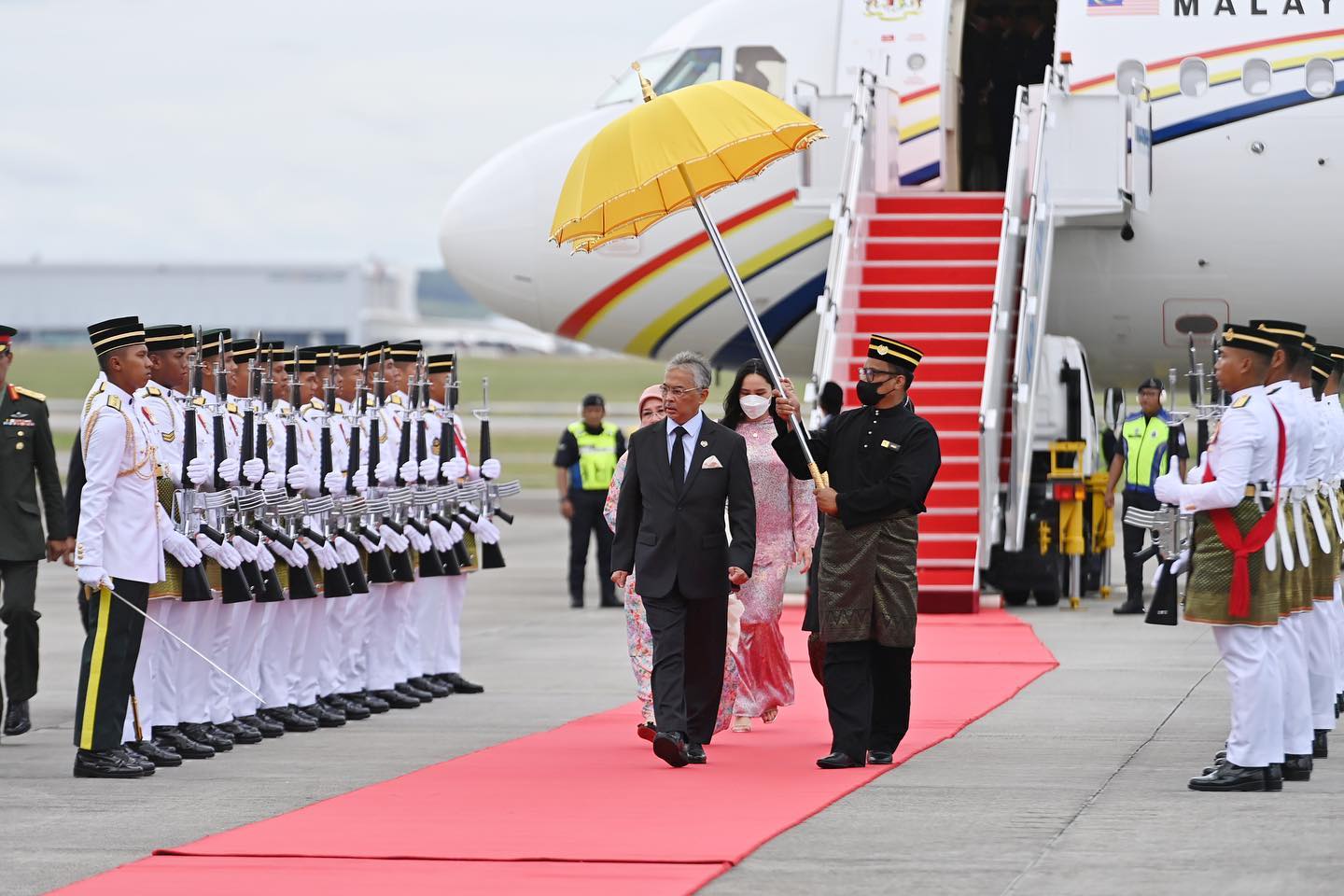 King, Queen arrive home from UK