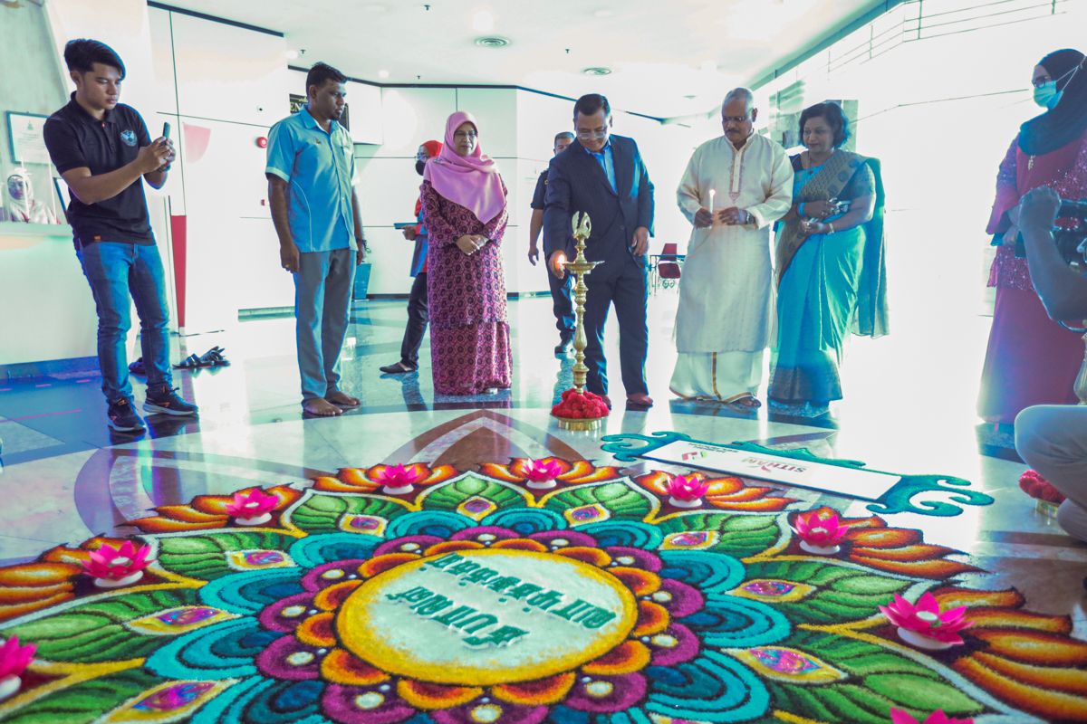 MB officiates rangoli at state administration building