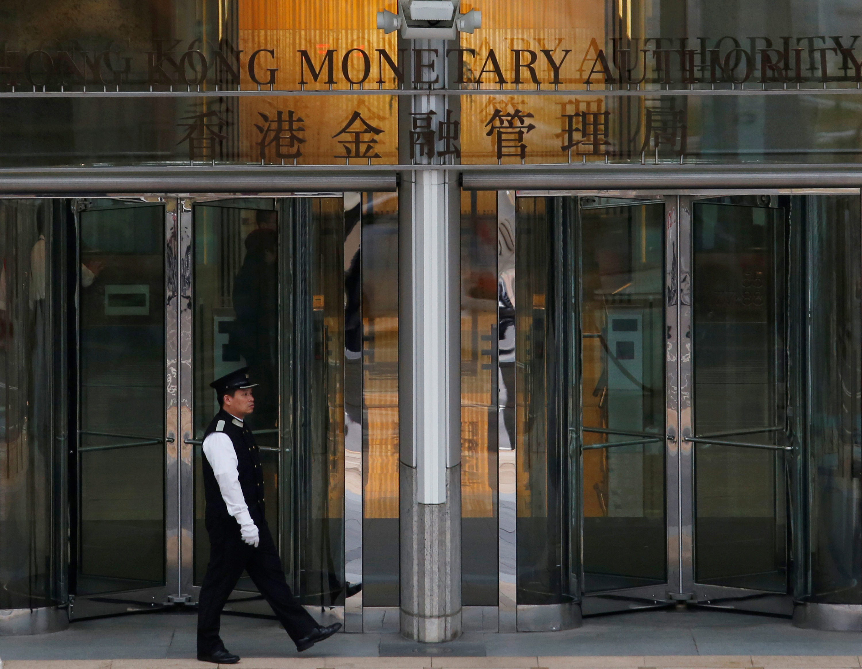 Hong Kong central bank raises interest rate after Fed, warns of borrowing risks