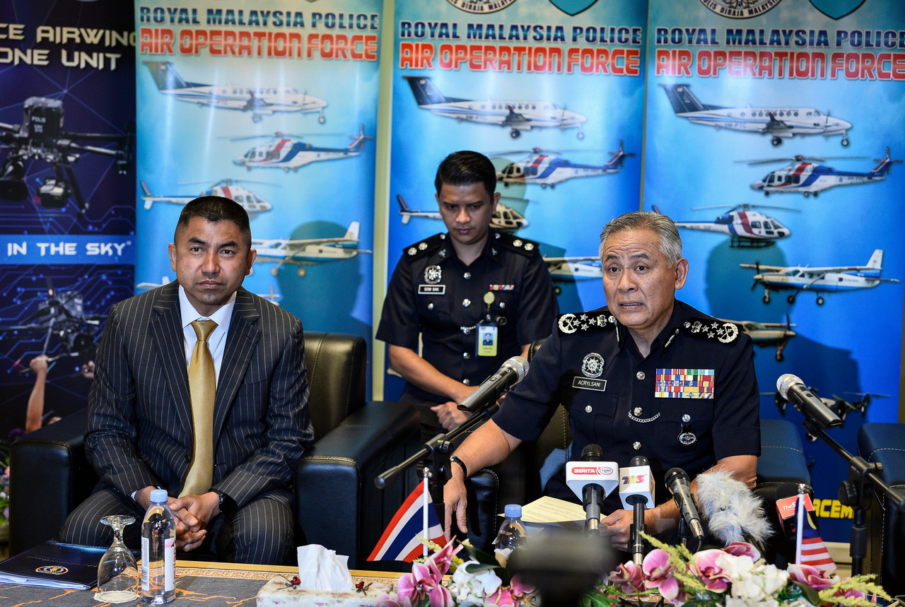 Malaysian police hand over three women involved in human trafficking to Thai police