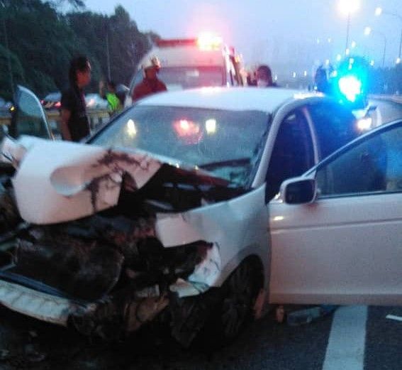 Woman dies after car hits trailer near Sungai Buloh layby