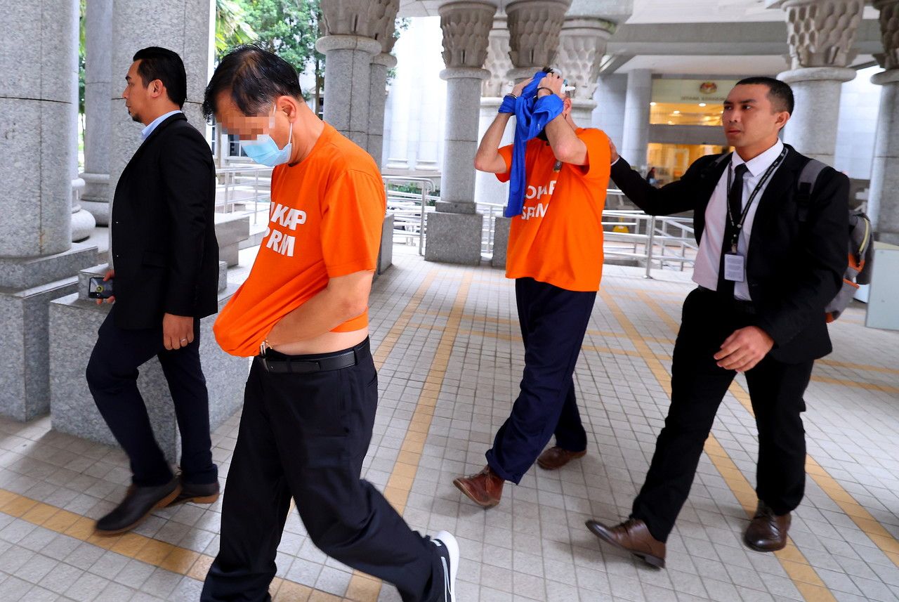 Two men on six-day remand to assist in false claims investigation