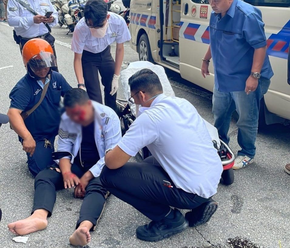 கார்-மோட்டார் சைக்கிள் விபத்தில் போக்குவரத்து போலீஸ்காரர் காயம்