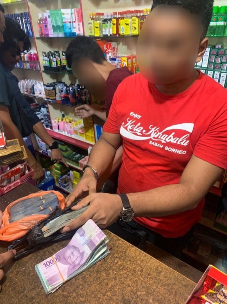 雪隆区非法外币兑换中心遭外界   3首脑等29嫌犯被捕