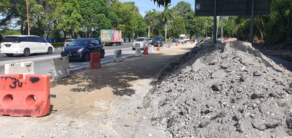 提升金泉路弯角处解积水 梁德志:2要道重铺惠民