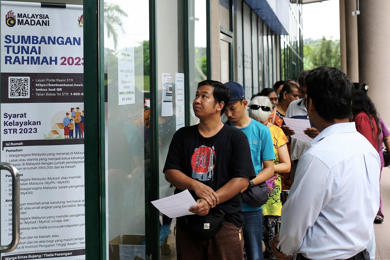 Anwar denies racial bias for govt aid