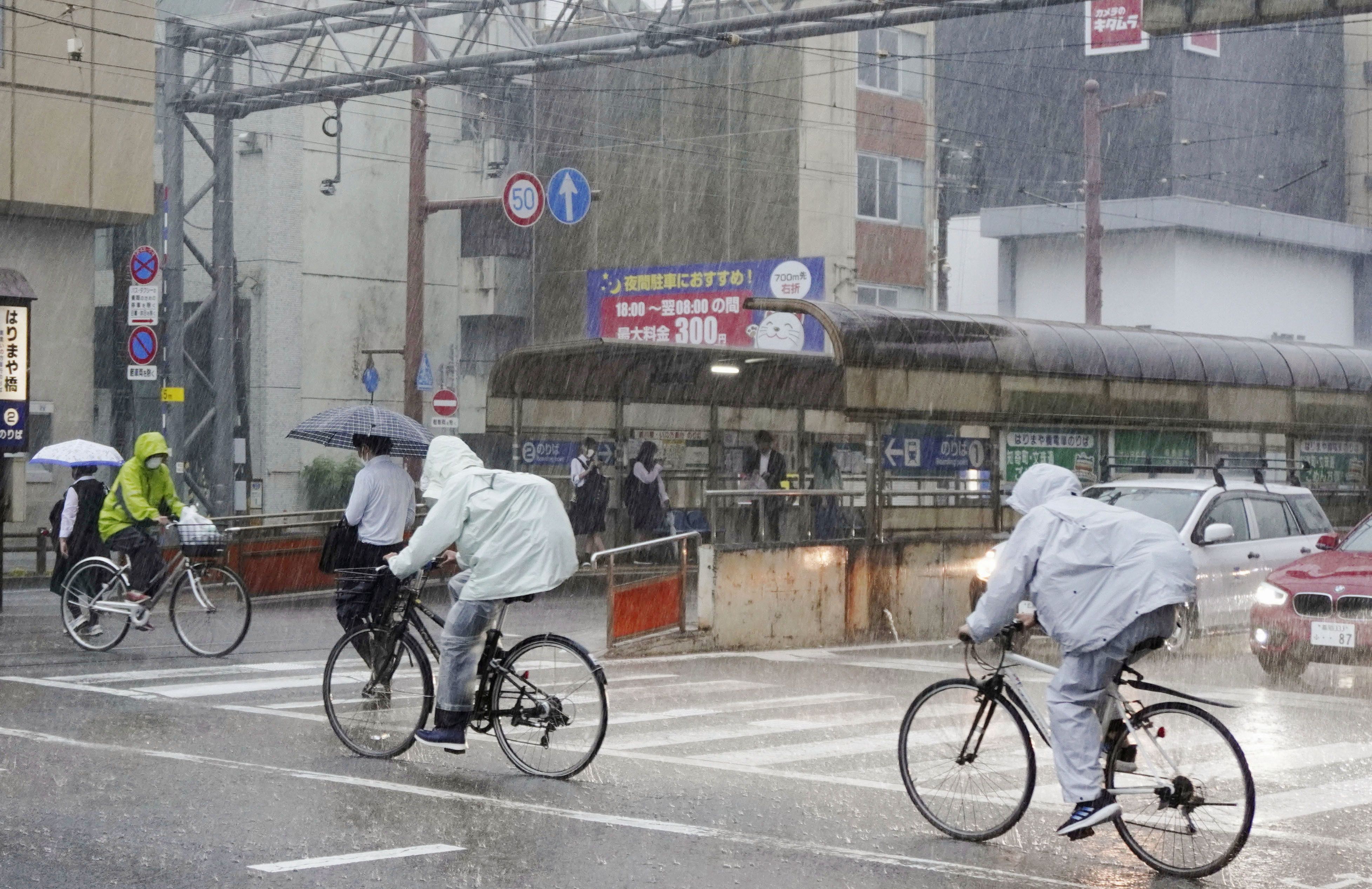 Japan slammed by torrential rain as typhoon nears