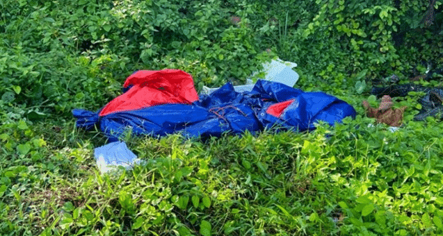 குப்பைக் குவியலுக்கு மத்தியில் கேன்வாஸ் பையில் இரு உடல்கள் கண்டுபிடிப்பு