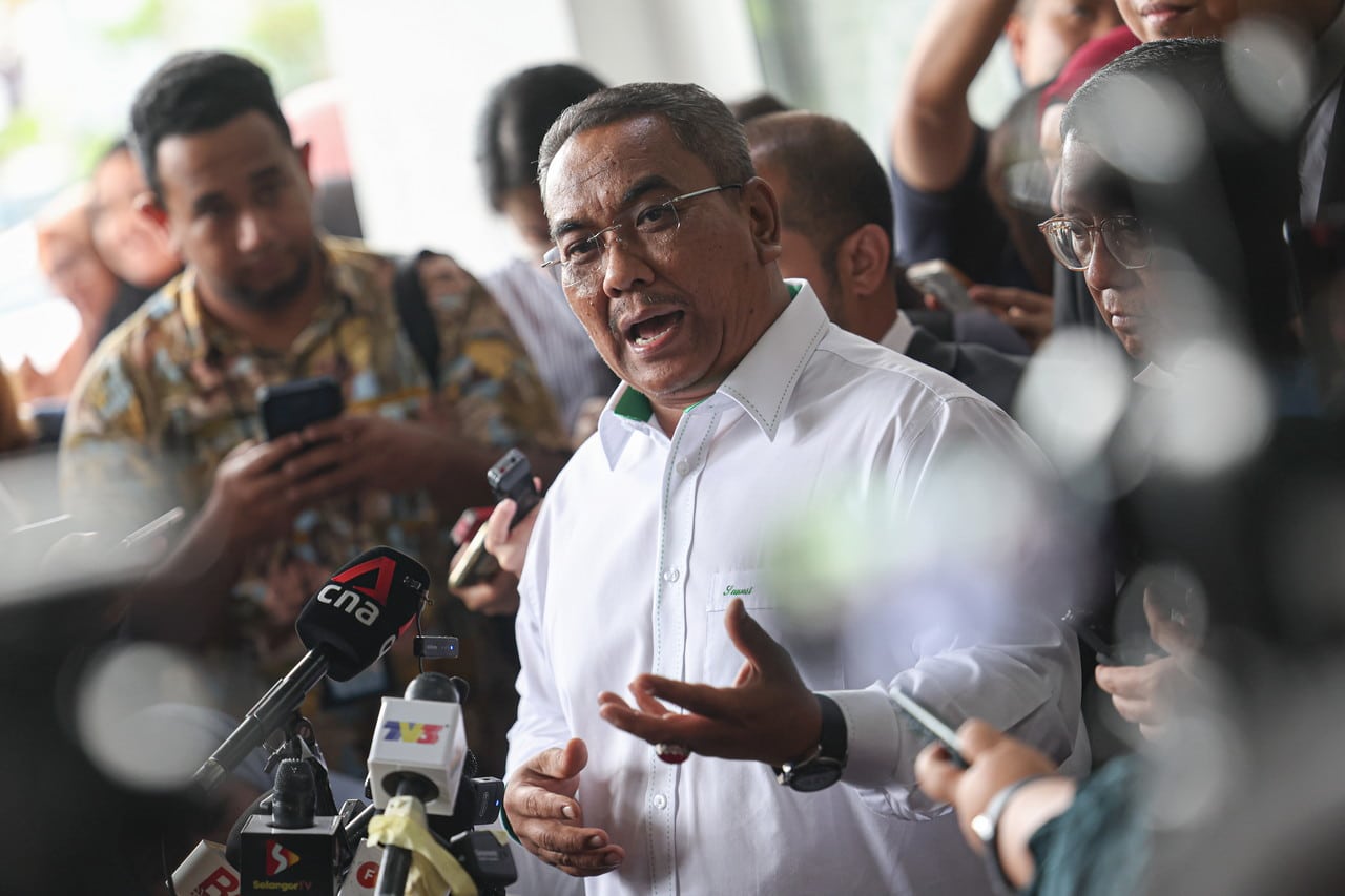 Anwar, Sanusi end defamation case amicably