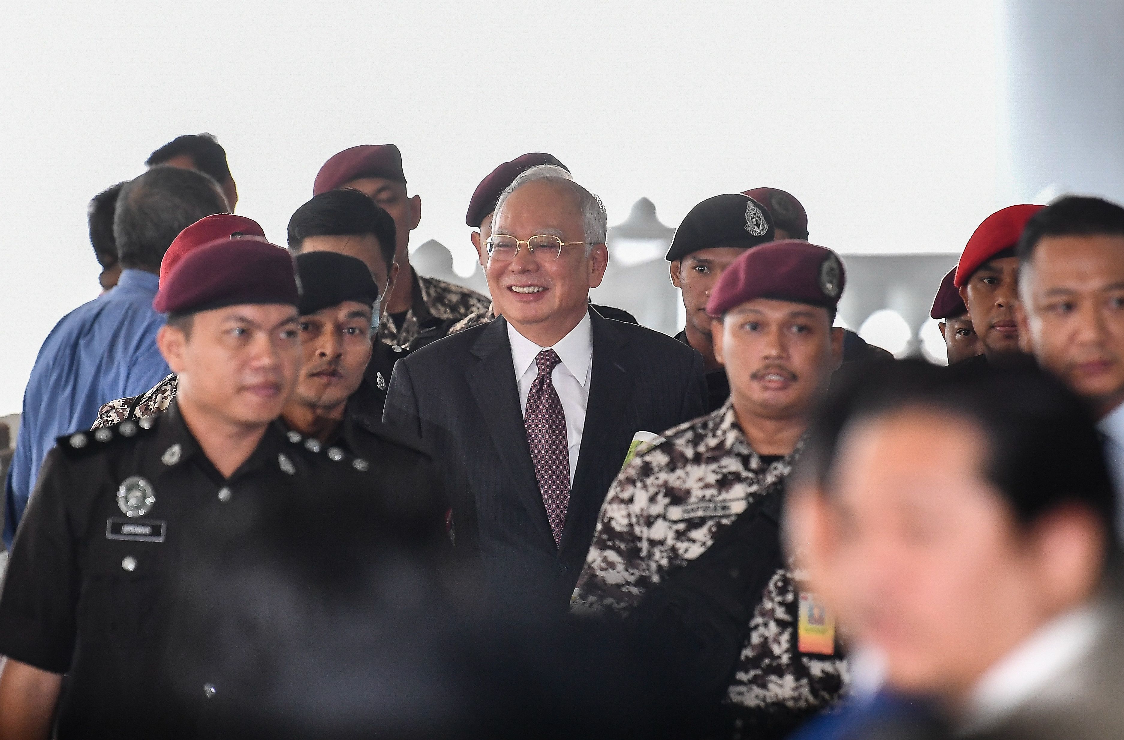 纳吉1MDB滥权洗钱案    高庭明裁决表面罪名