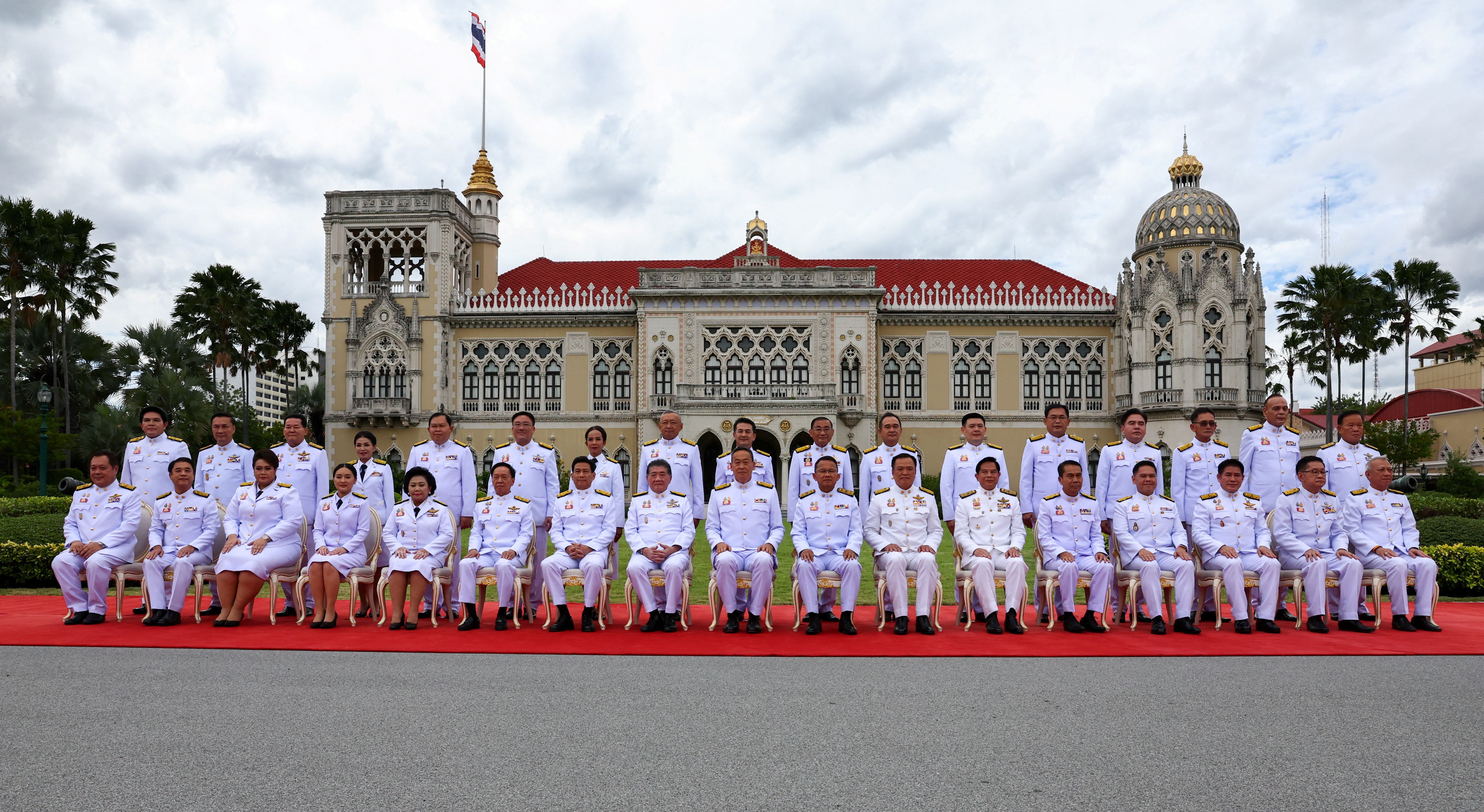 Thai king swears in new PM and cabinet