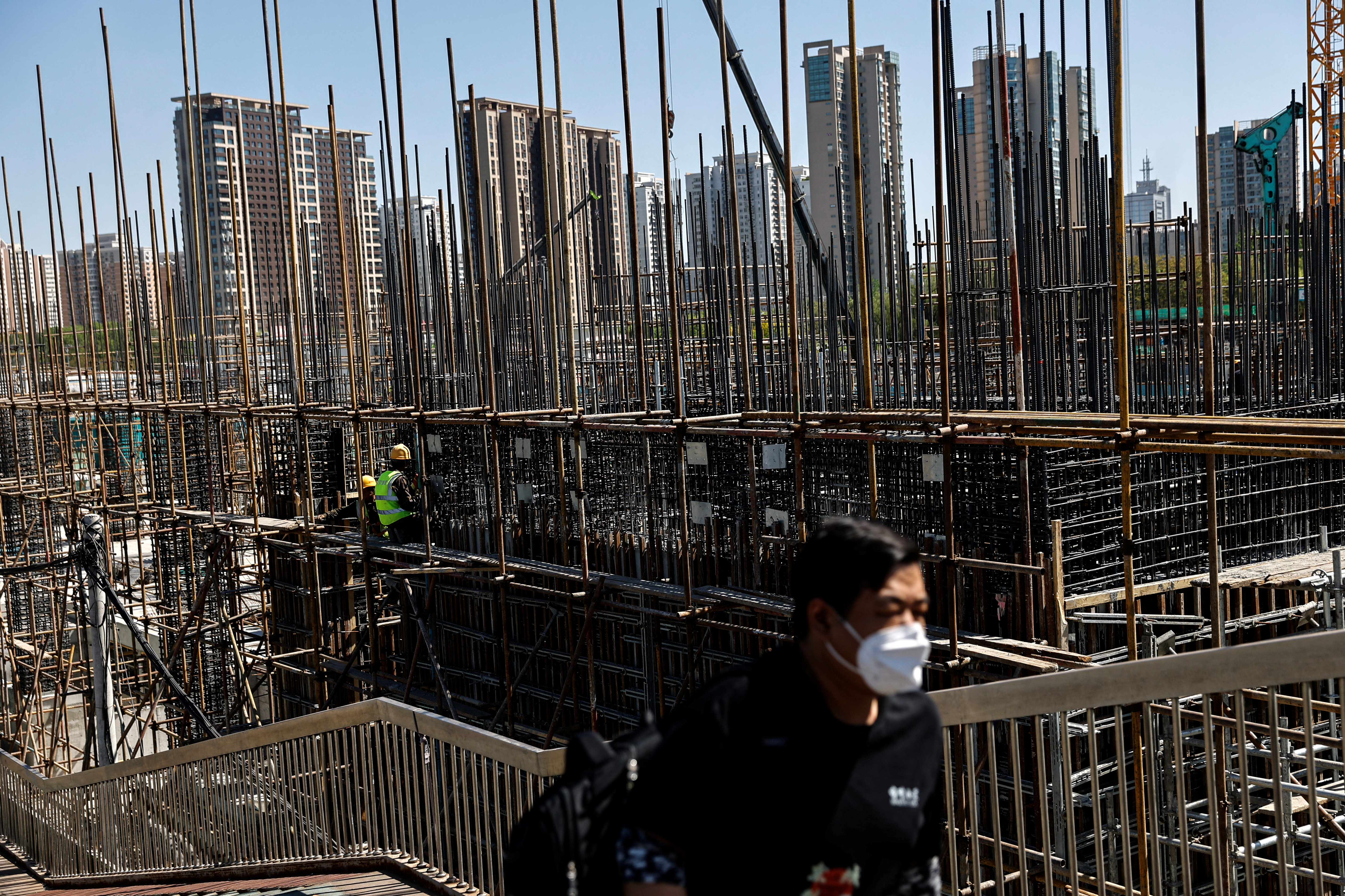 China's third quarter economic growth beats market forecast but headwinds persist