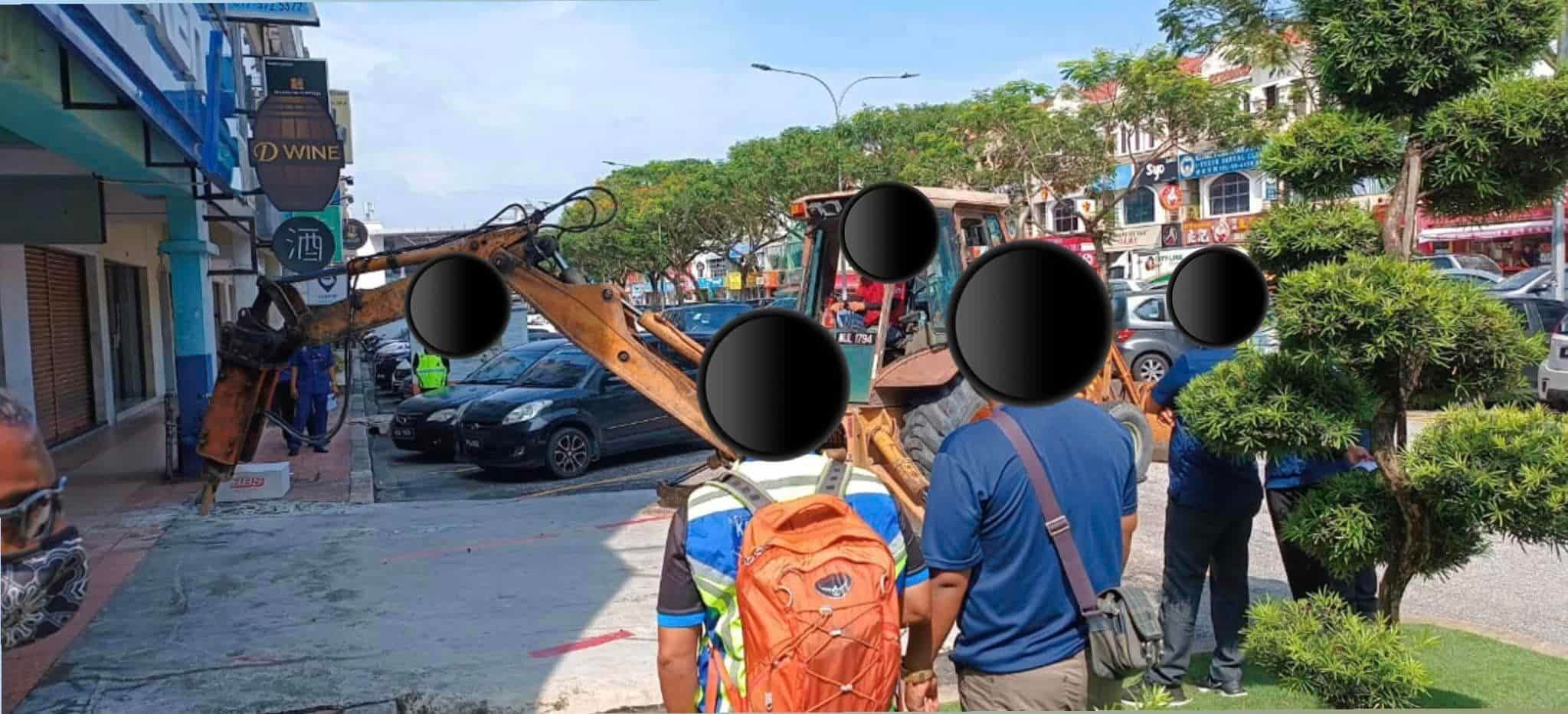 滥用停车位建斜道  灵市政厅拉大队取缔拆除