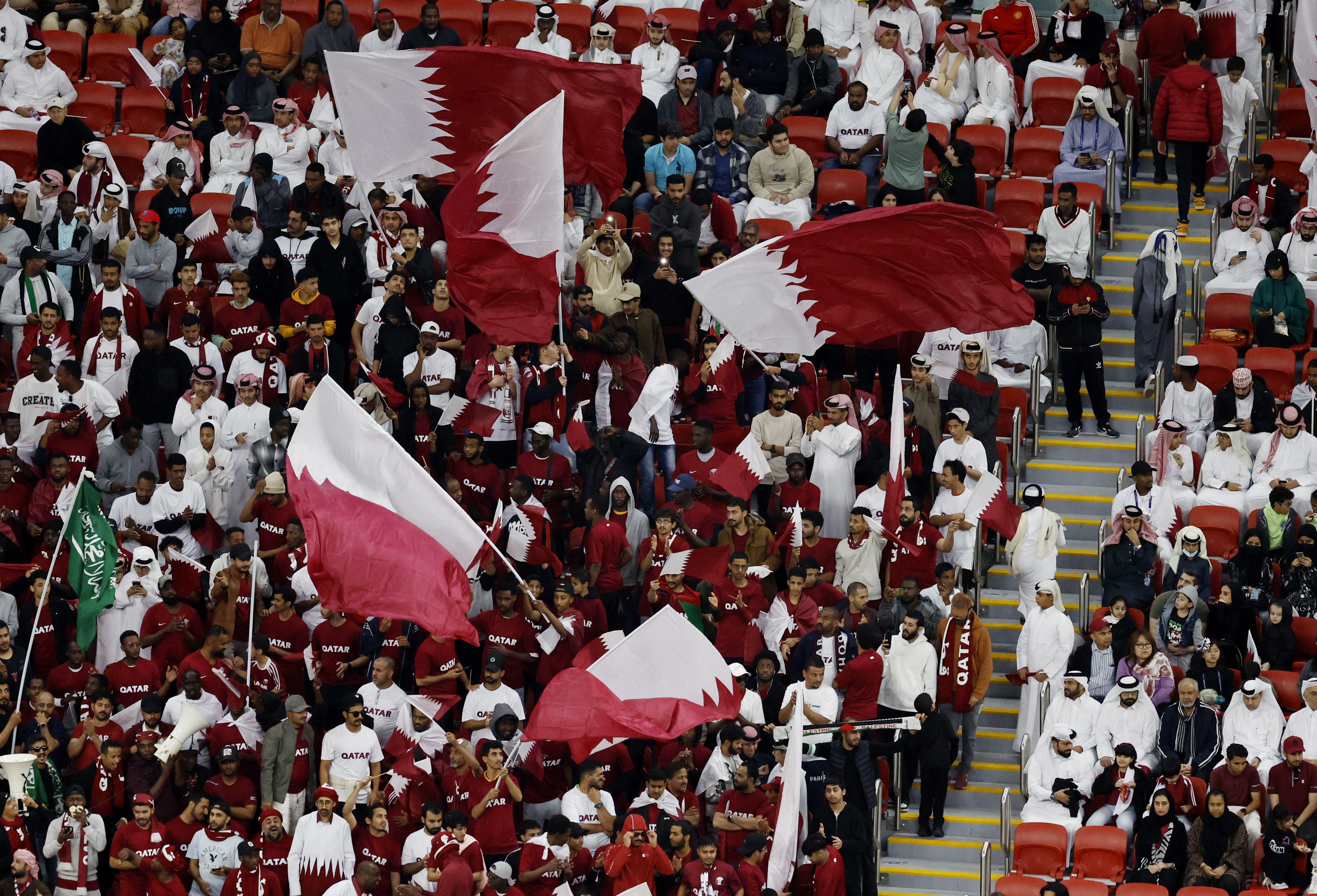 Host Qatar first nation into Asian Cup last 16 