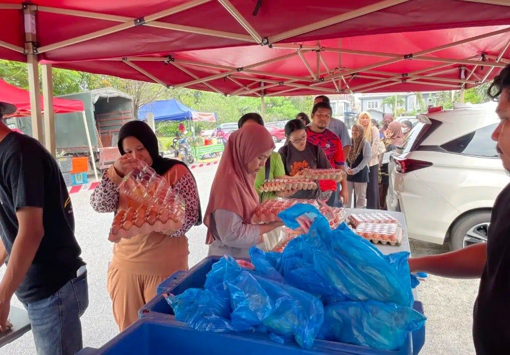价廉物美慈悯市集明3地点开卖   肉鸡每只RM10.白米每包RM13