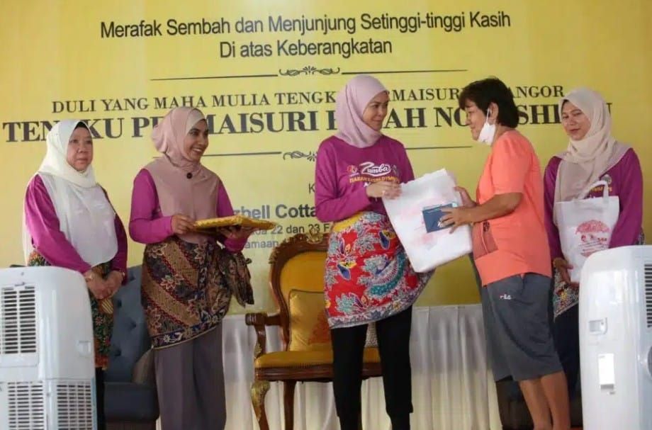 雪妇女福利联合会积极施赠送暖  不分种族背景帮助各群体