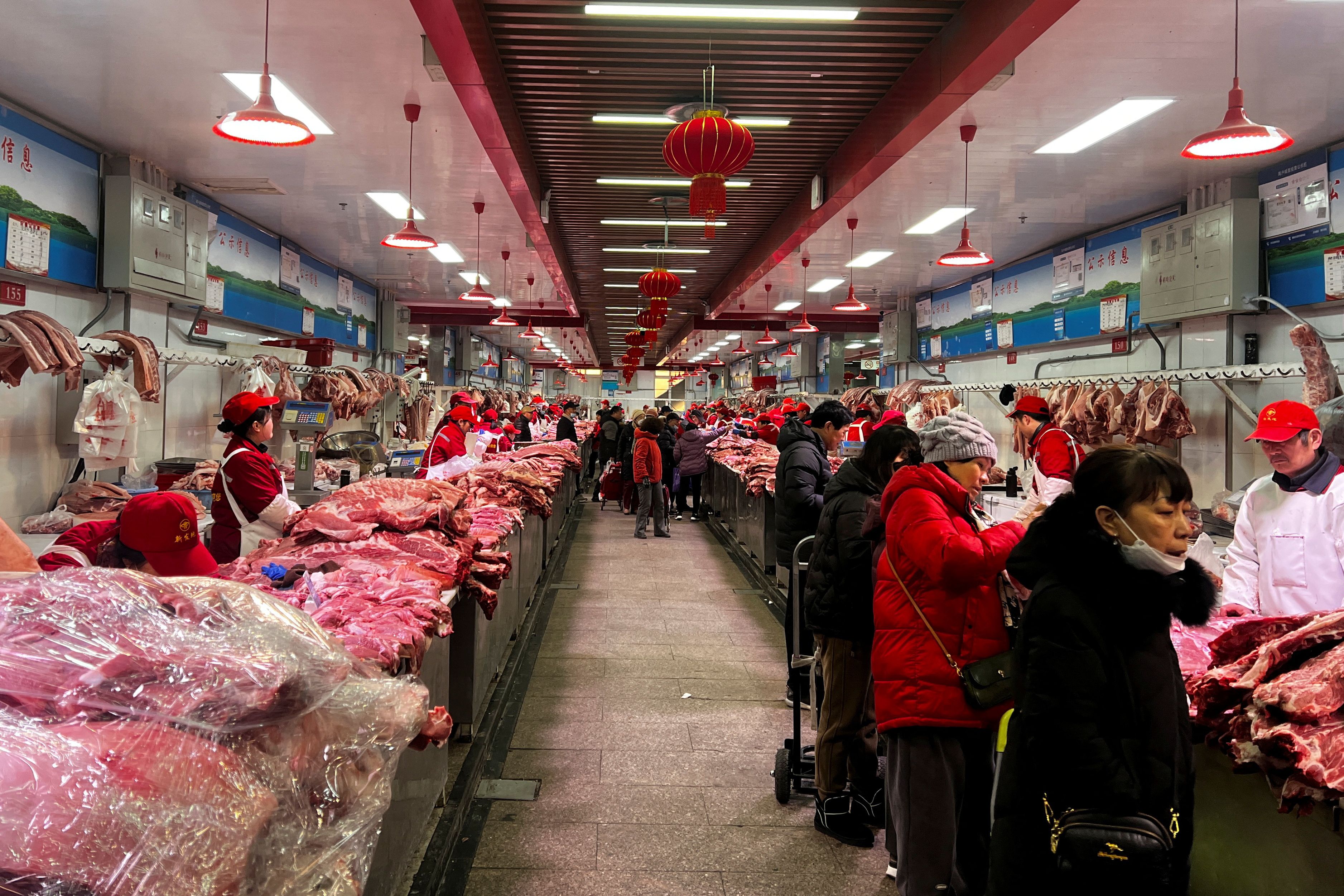 China's consumer prices swing up on seasonal Lunar New Year gains