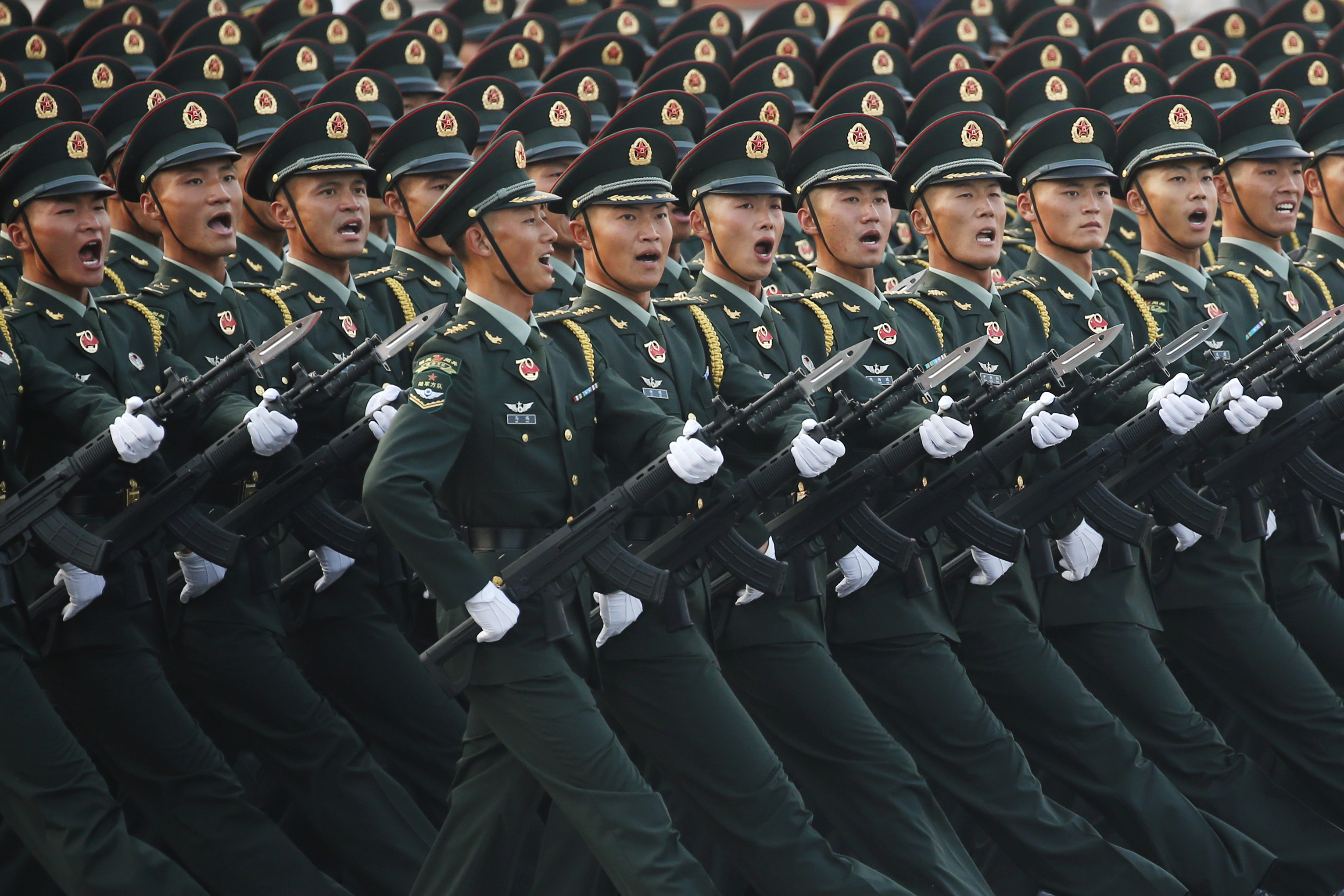 China drops 'peaceful reunification' reference to Taiwan, raises defence spending by 7.2 pct