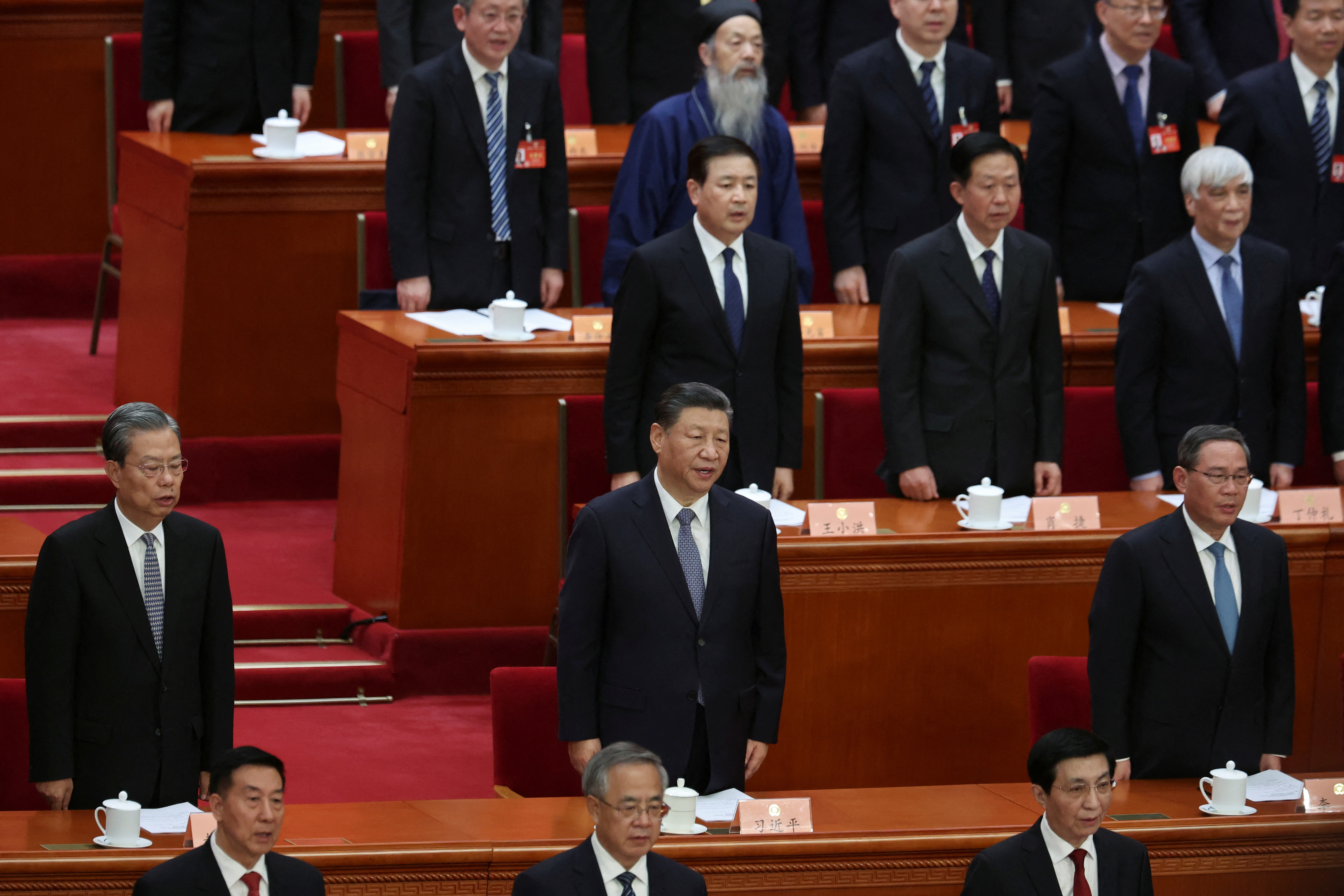 China vows to transform economic model, targets growth at around 5 per cent