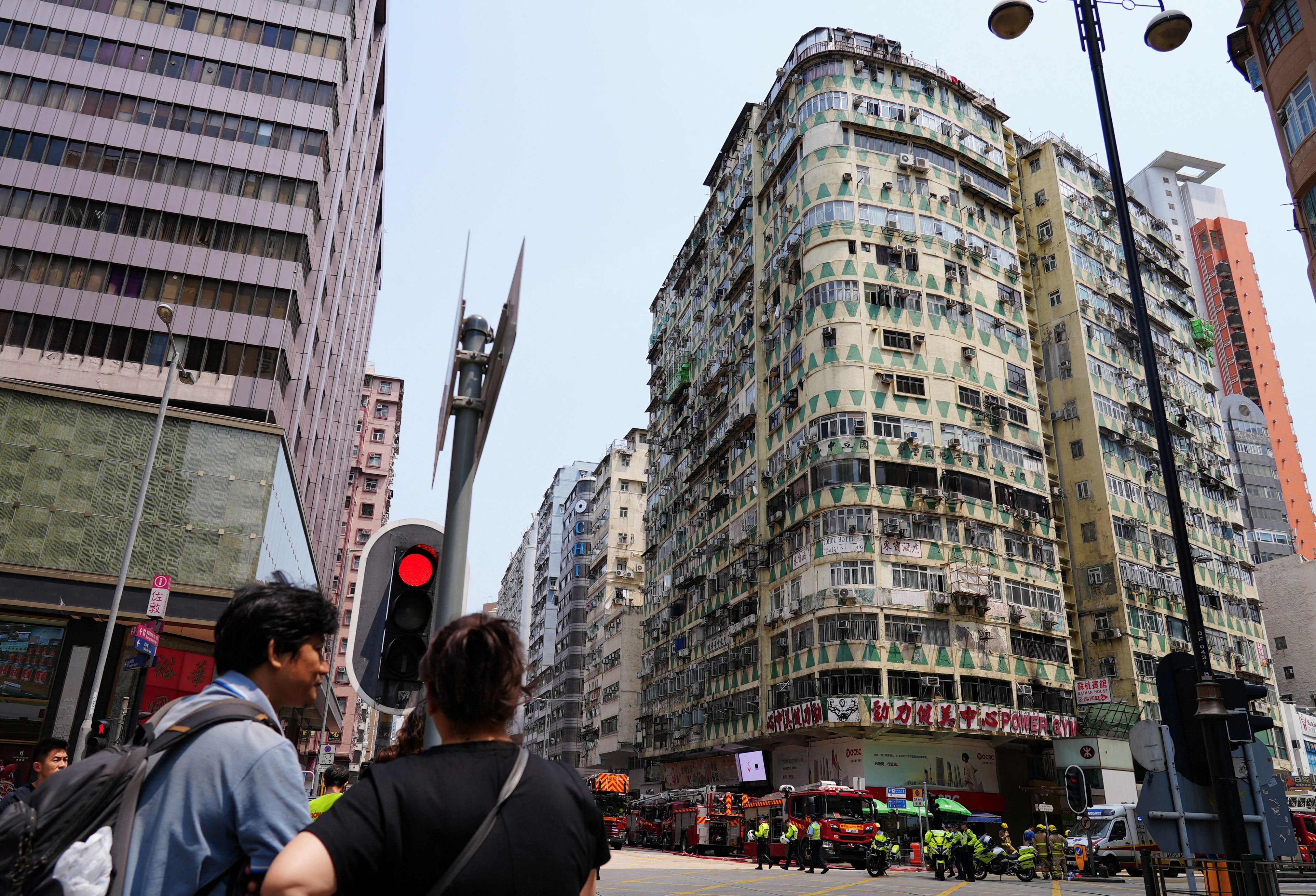 Fire in packed Hong Kong building kills five, dozens in hospital