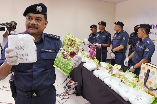 槟城一围篱社区树下 起获茶叶袋装有30公斤毒品