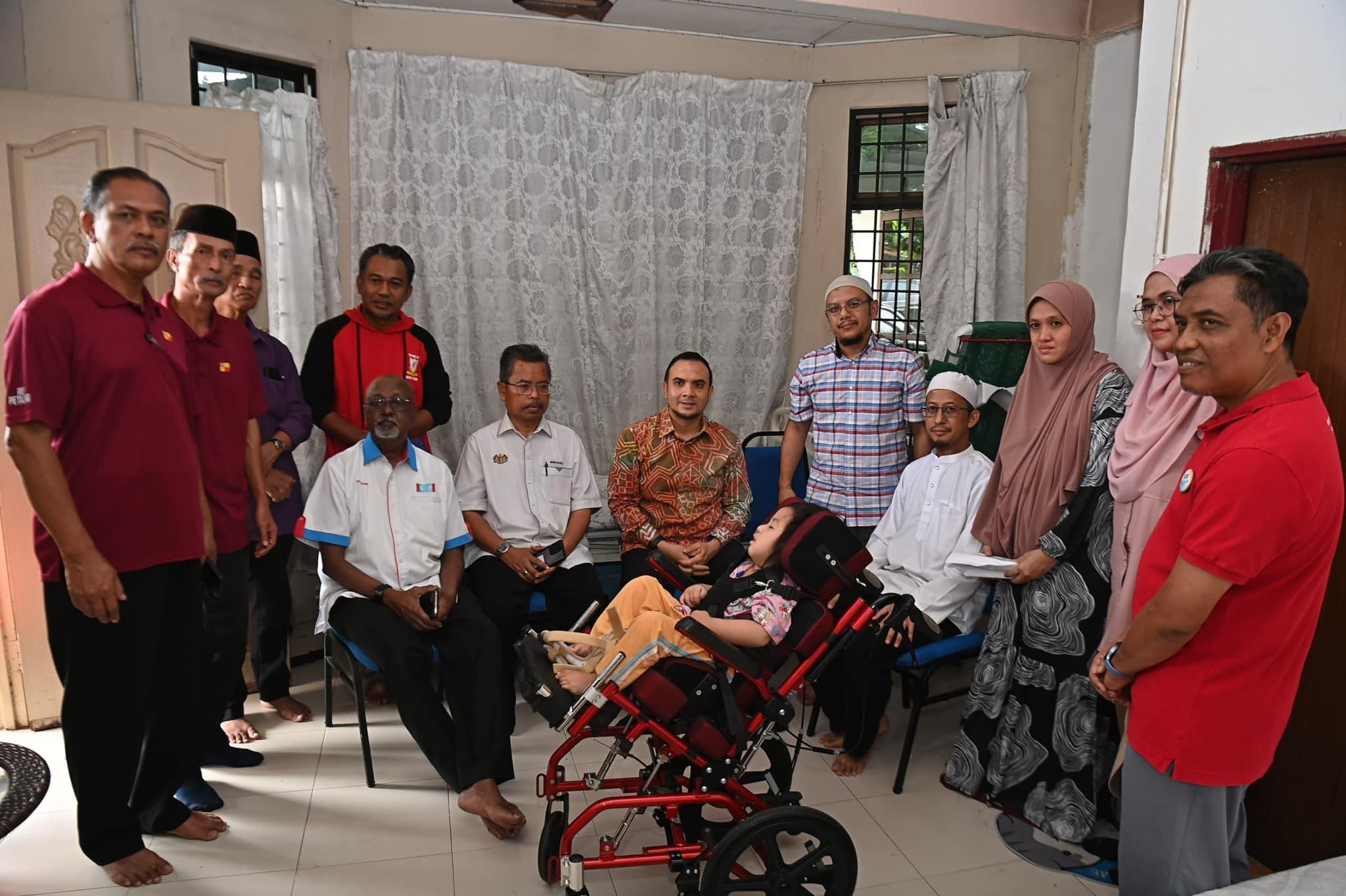 Anwar hands over donation to cover disabled infant's medical costs