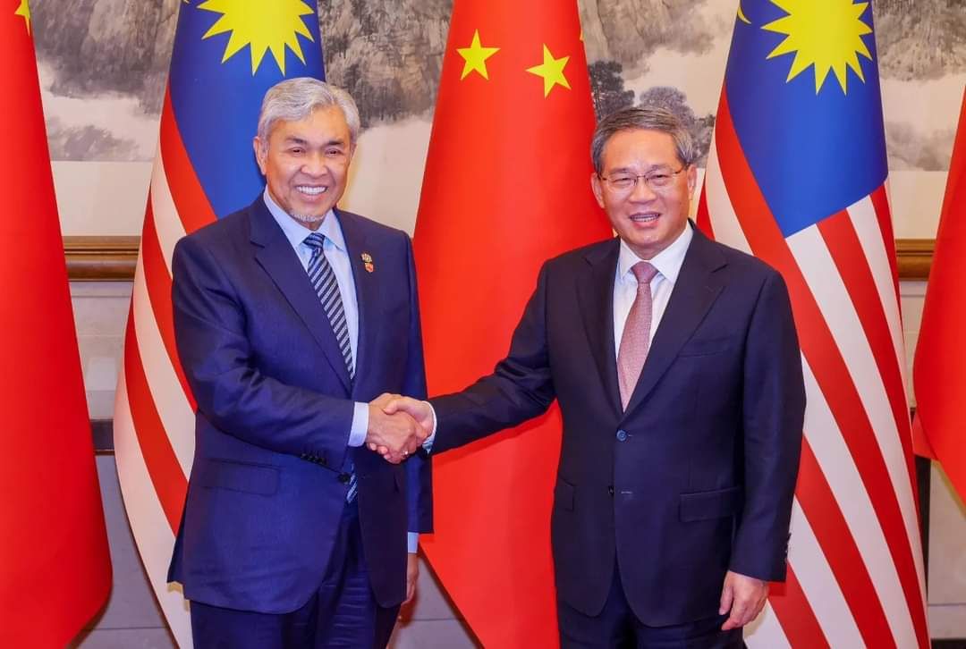 扎希礼貌拜会中国总理李强