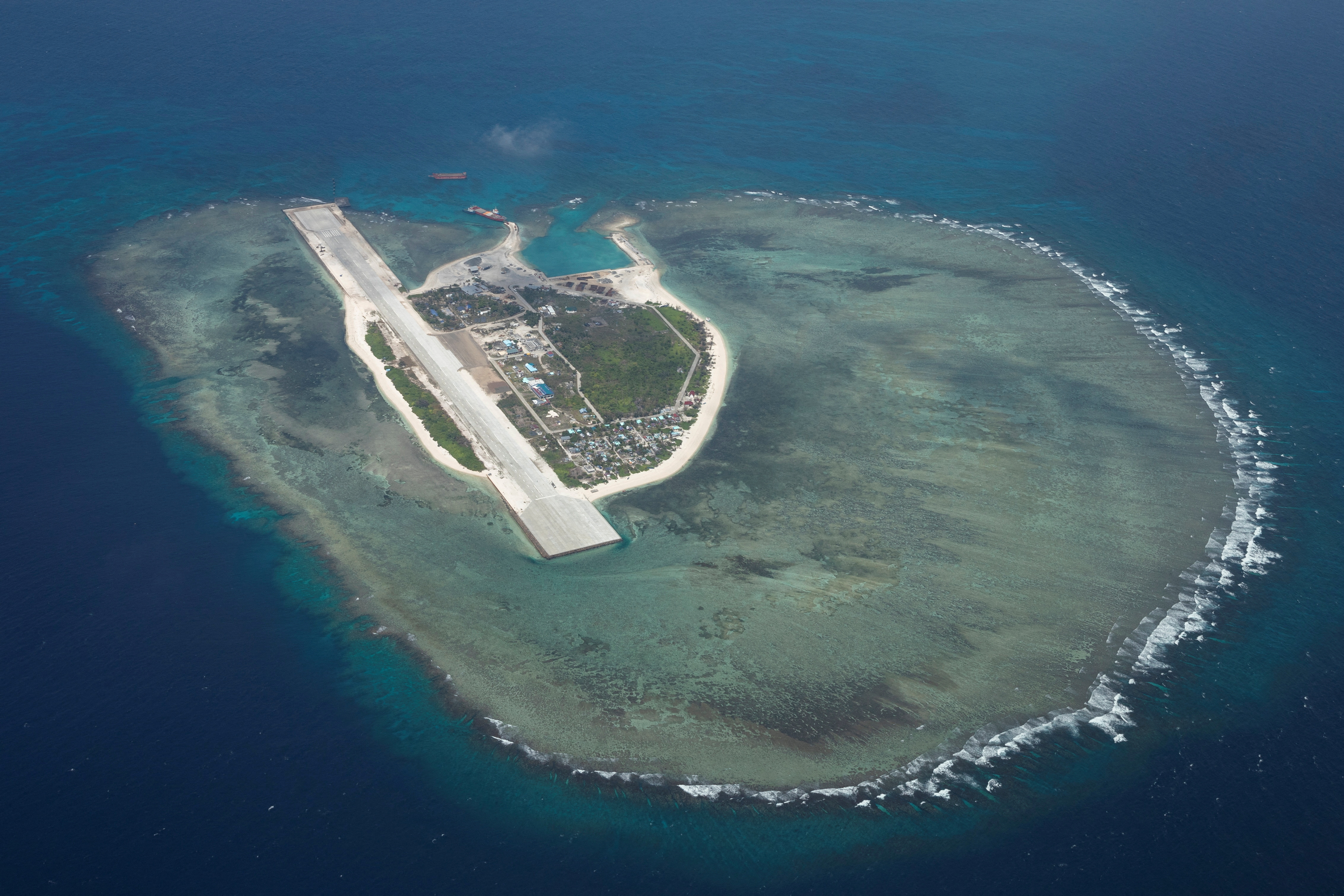 Vietnam opposes China, Philippines acts on disputed South China Sea reef