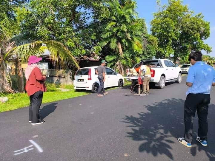 瓜冷市会与Infrasel  验收3住宅区铺路工程质量