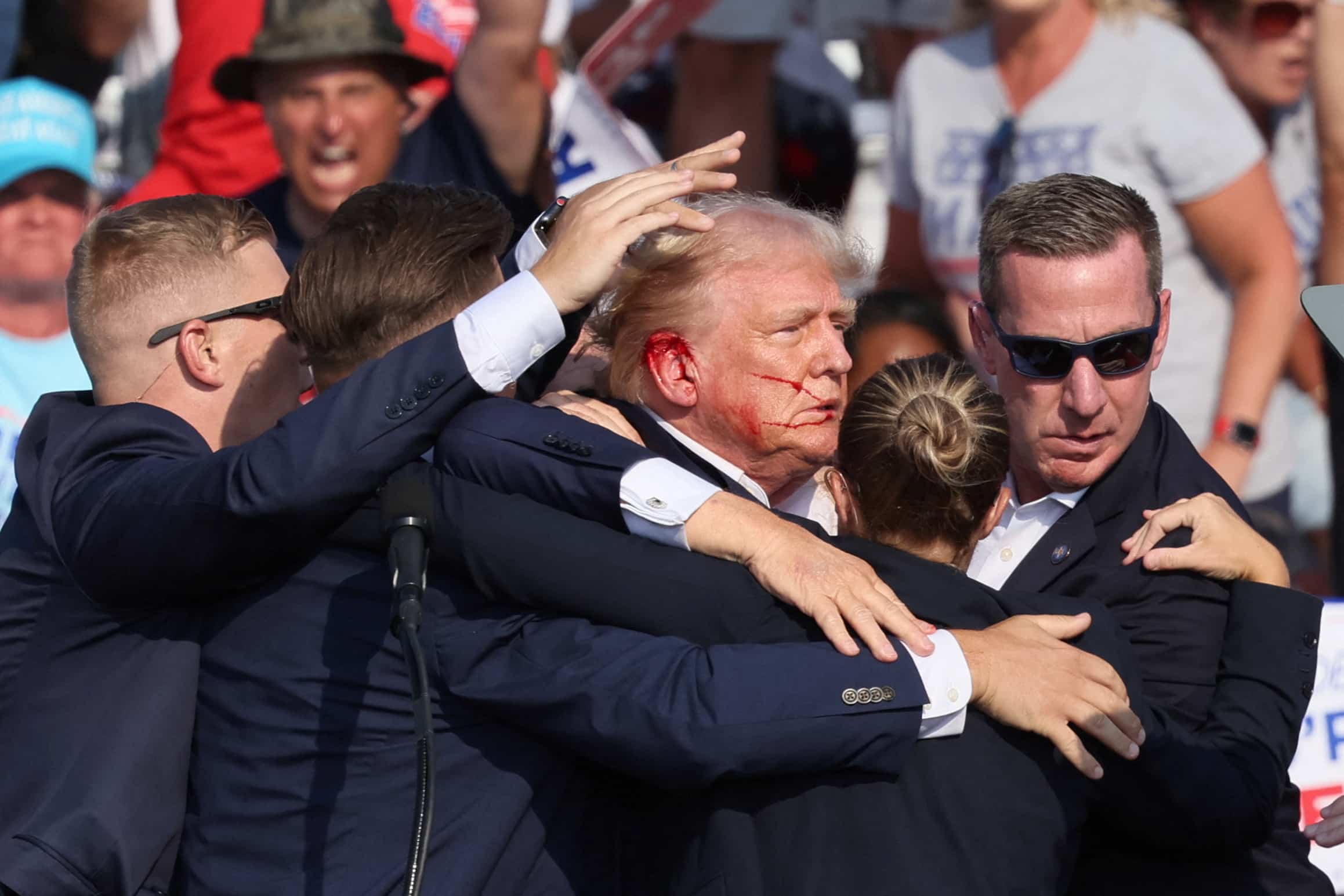 Trump wounded, two dead in assassination attempt 