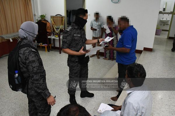 今晨突击十五碑豪华公寓 隆移民局逮40非法移民