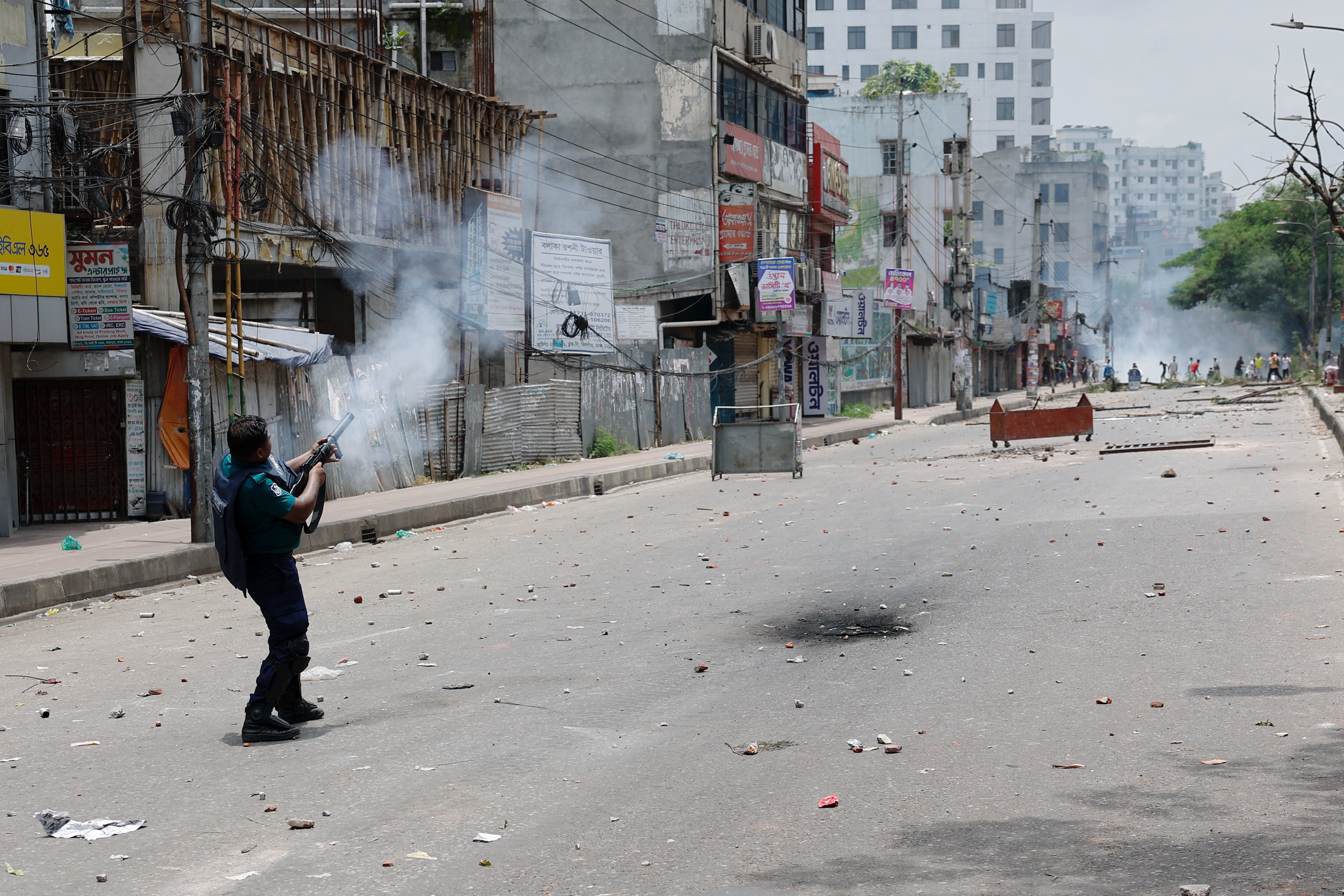 Bangladesh shuts offices, imposes curfew to curb deadly job quota protests