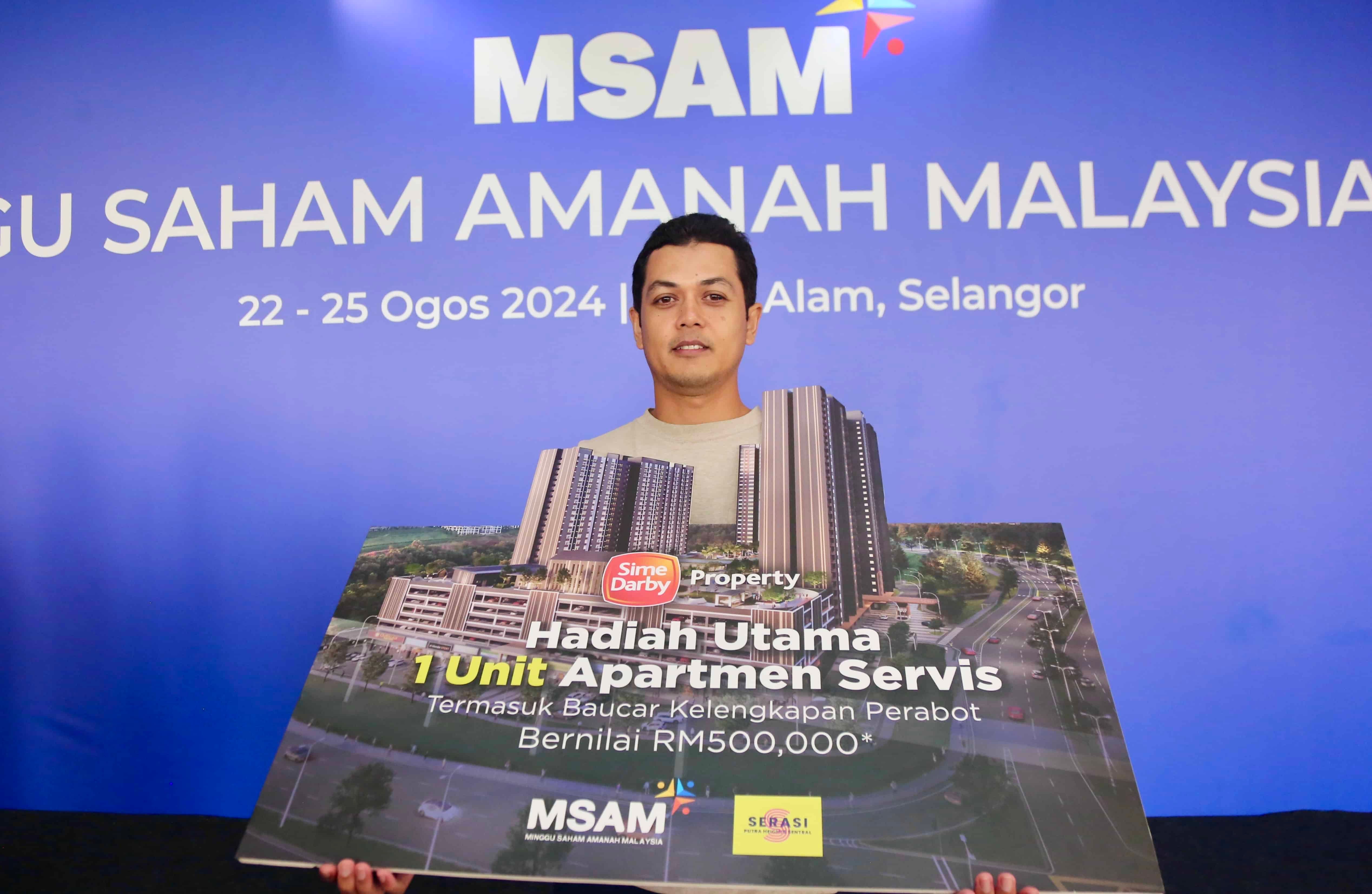 Minggu Saham Amanah, penolong juruukur menang cabutan bertuah rumah bernilai RM500,000