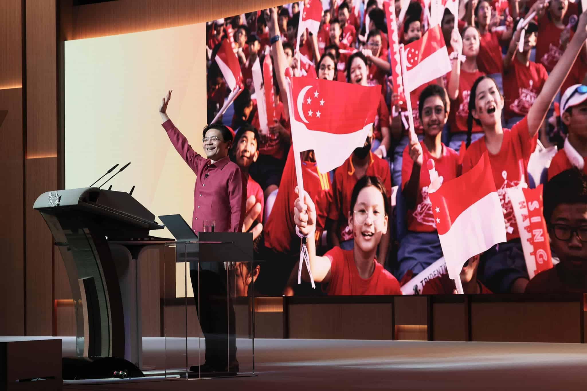 Singapore PM calls for attitude reset, offers perks at national day rally