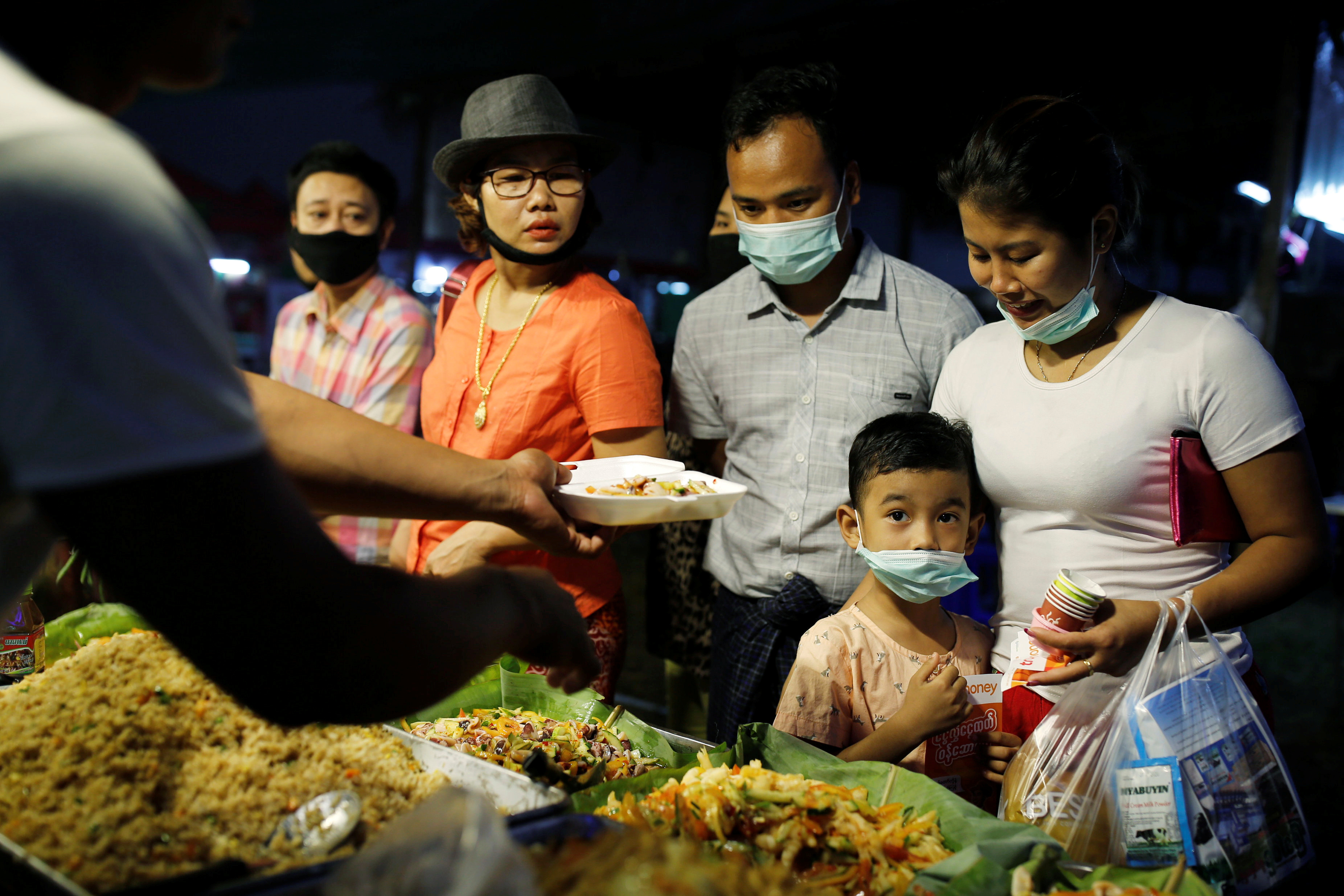 Myanmar households feel the pinch as currency tumbles to record low
