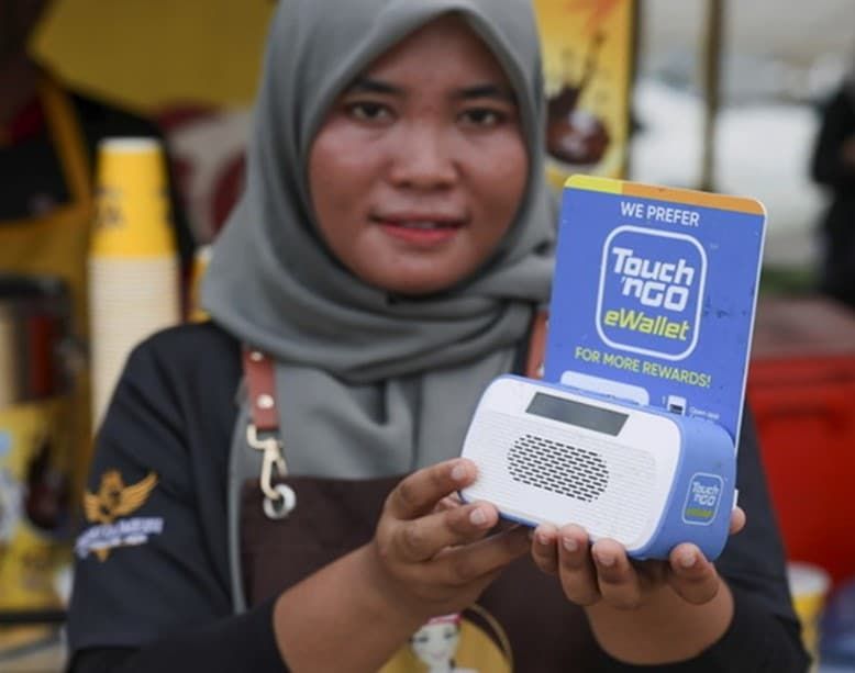 “无现金社会”促进垦殖民社区经济增长