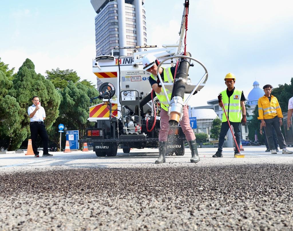 State looks to acquire another road-patching machine