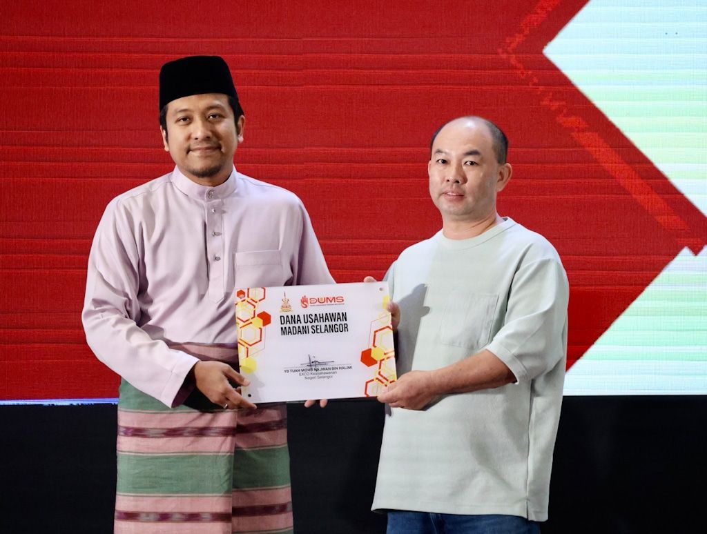 华裔商家喜获雪政府拨3万  添购新器材加强修车厂设备