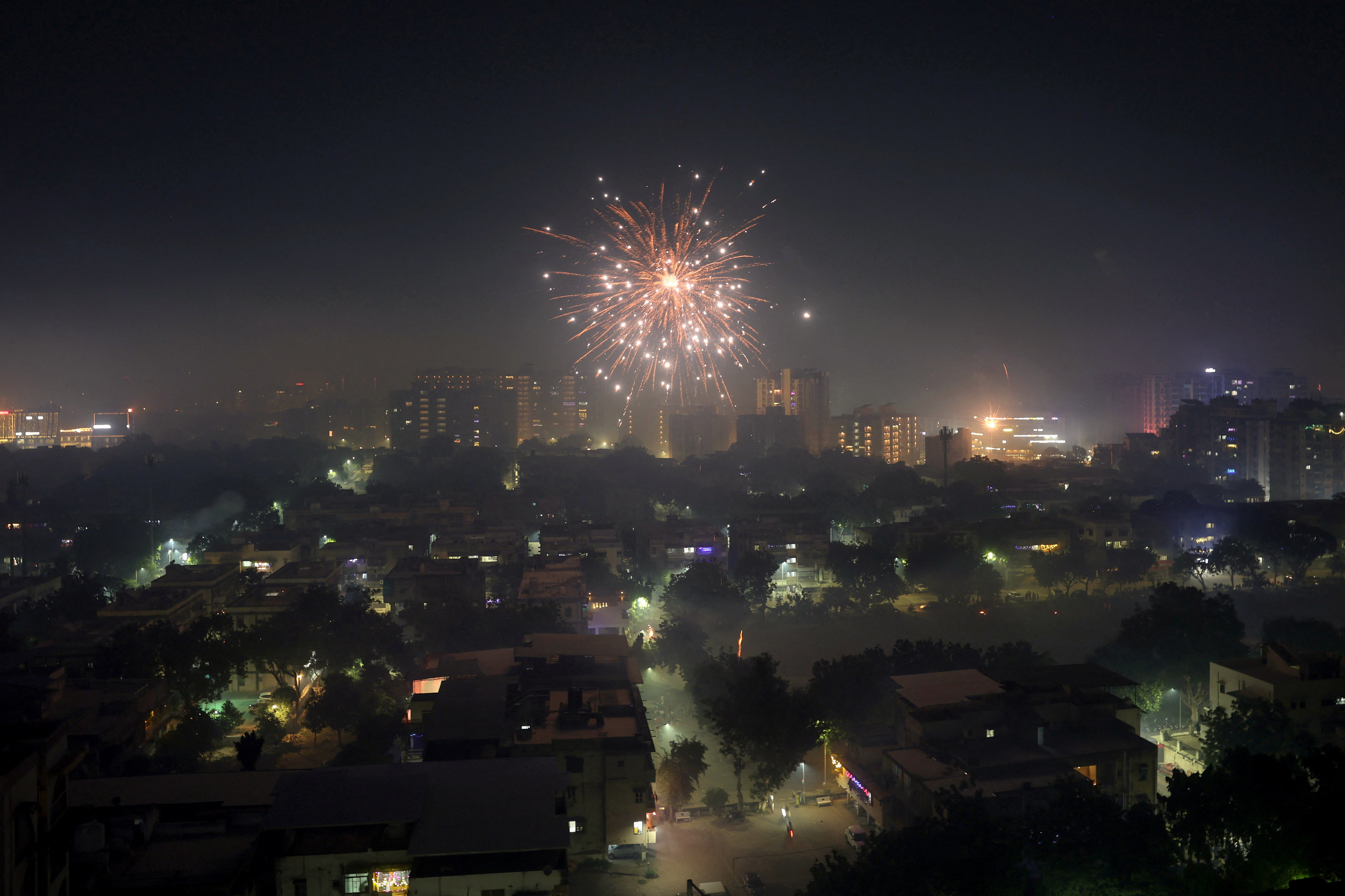 Despite bans, firecrackers sizzle across India for Diwali