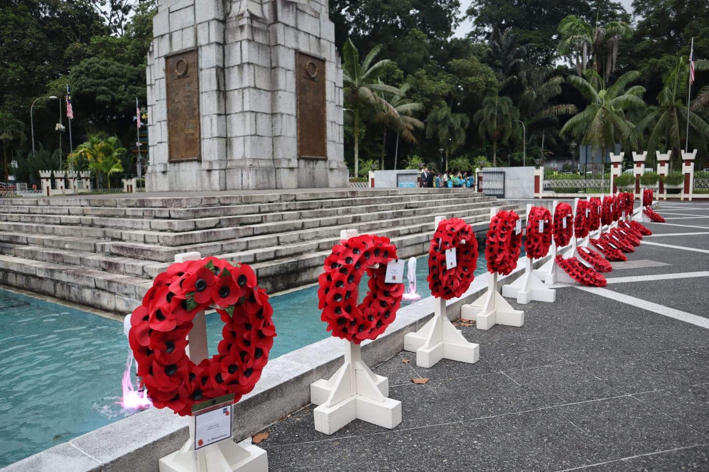Remembrance Day service returns to Tugu Negara on rainy Sunday