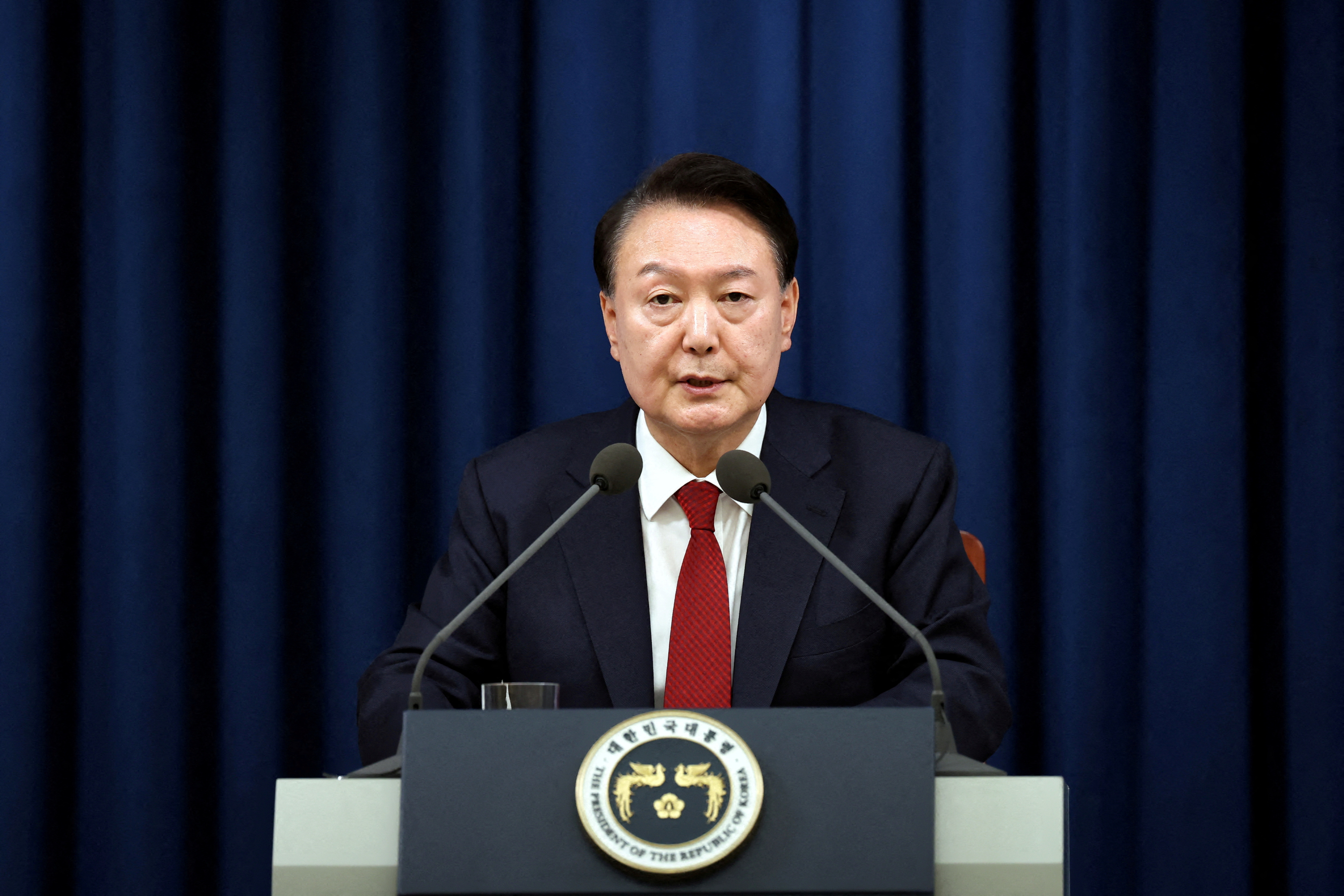 South Korea's Yoon survives martial law impeachment move after his party boycotts vote