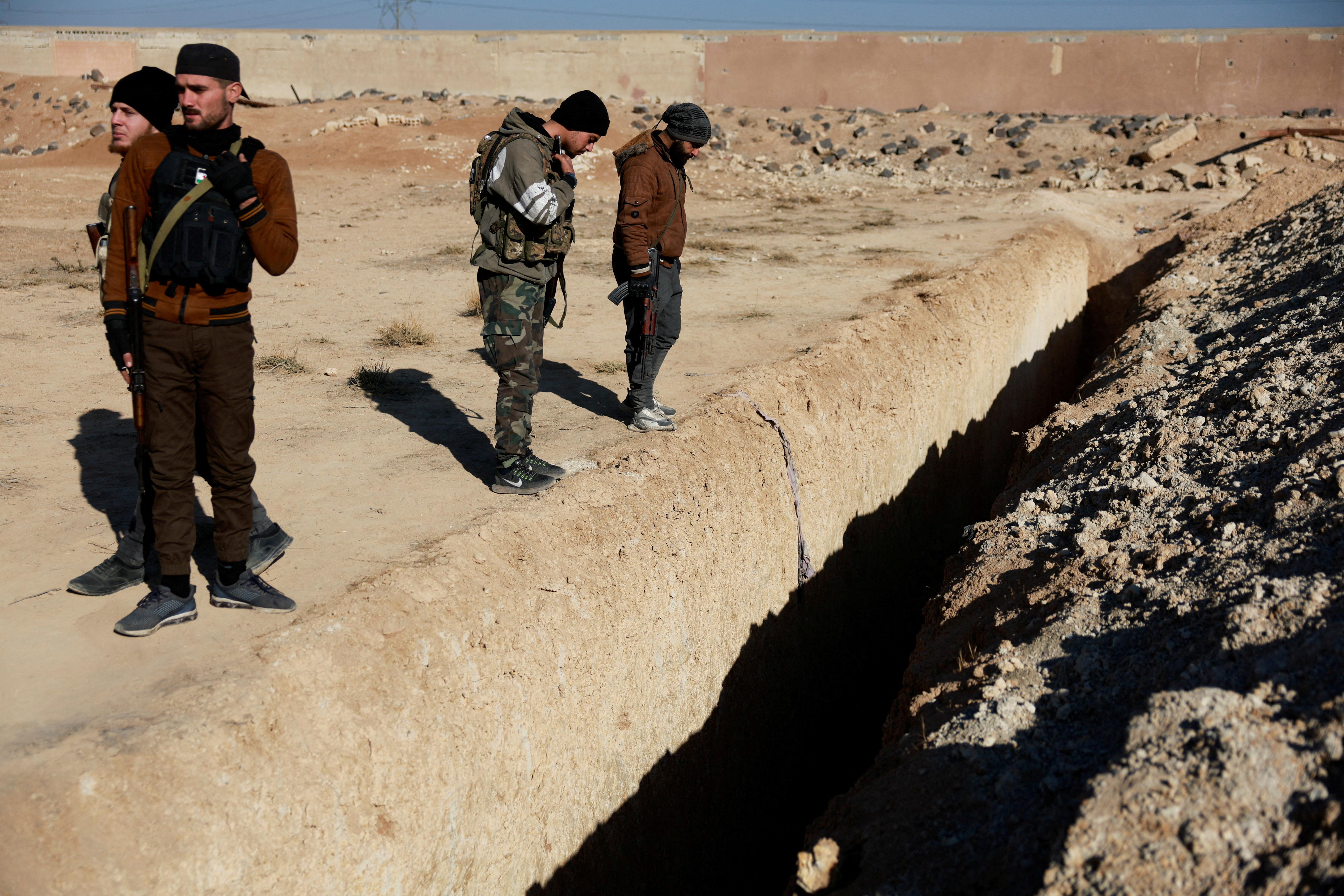 Syrian mass graves expose "machinery of death" under Assad