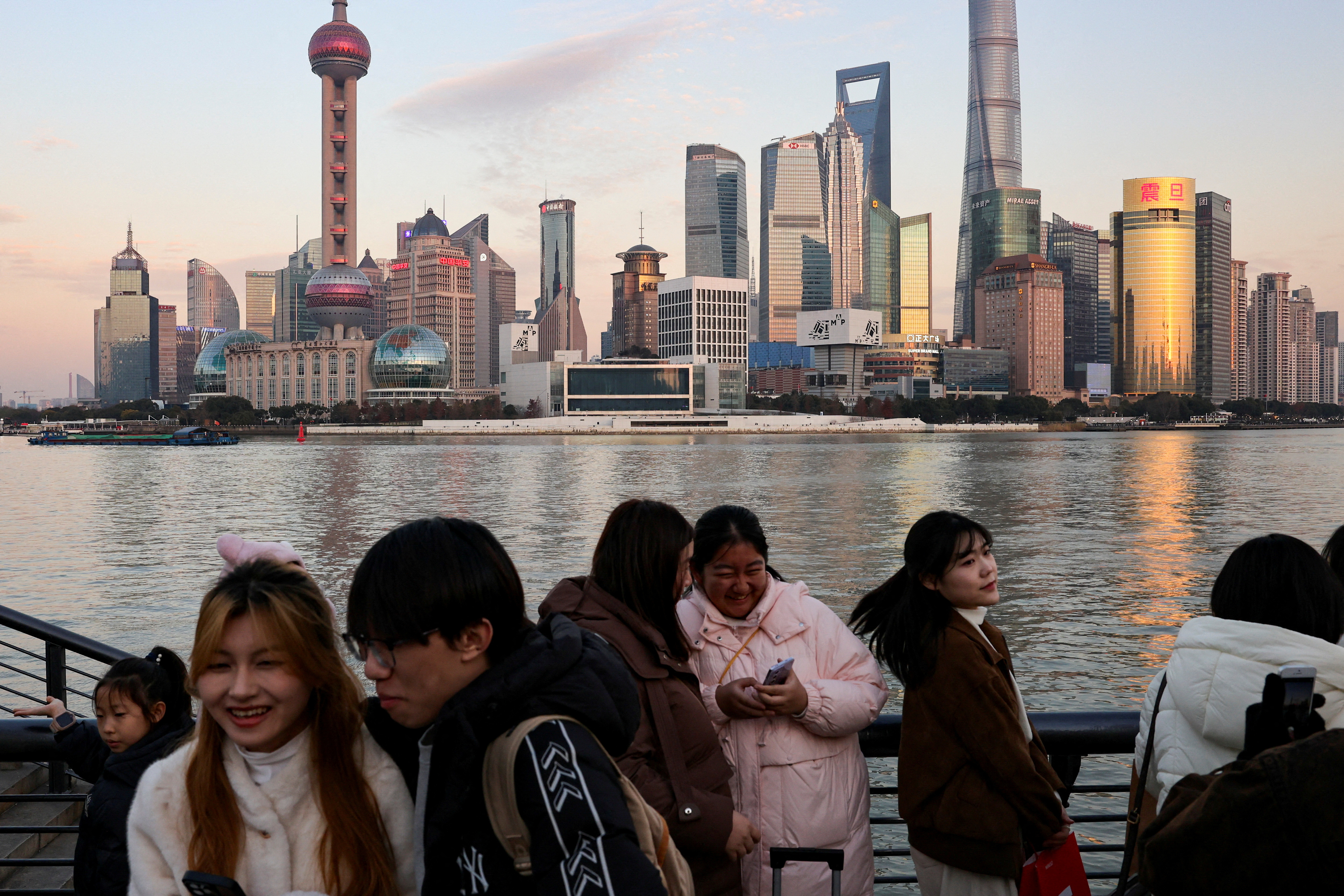 China's economic growth tops forecasts on stimulus push 