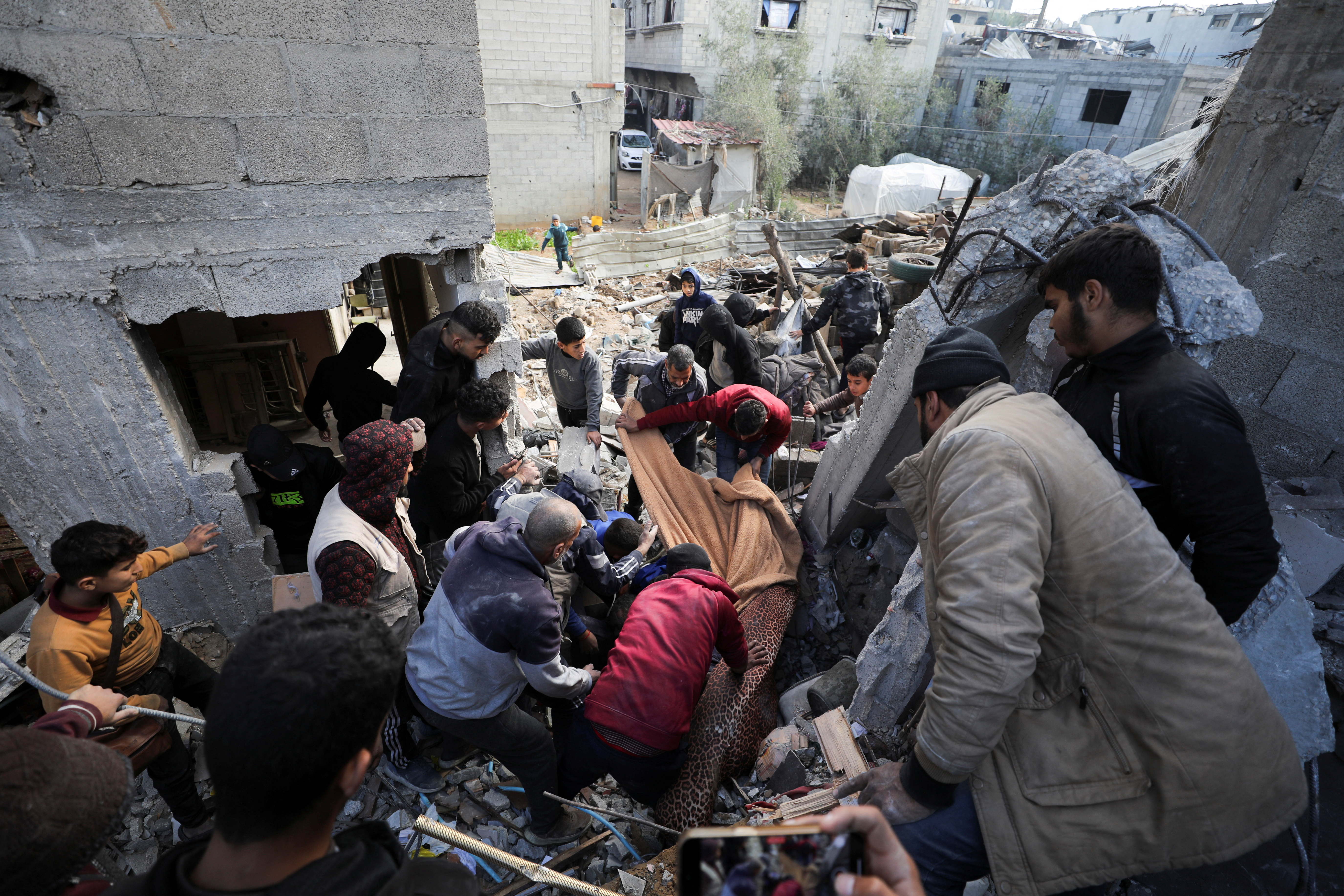 Israeli airstrikes kill 70 in Gaza as ceasefire talks resume