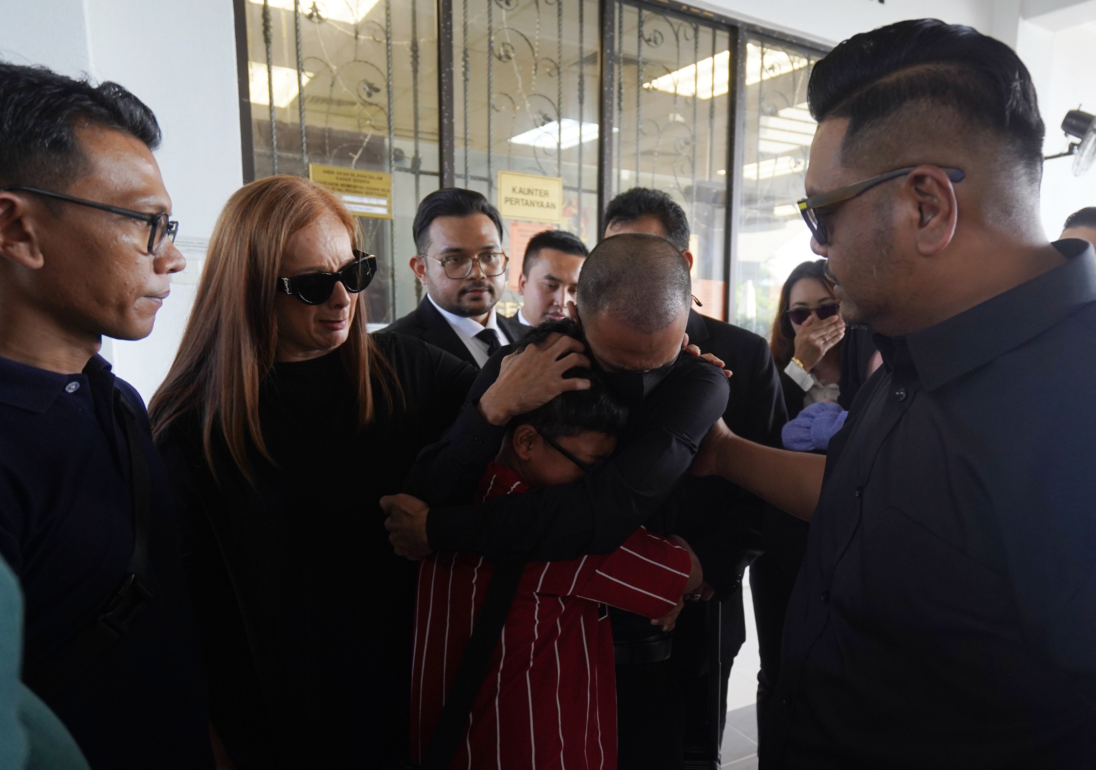 Along Cham performs 'sujud syukur' after being granted DNAA for cannabis possession