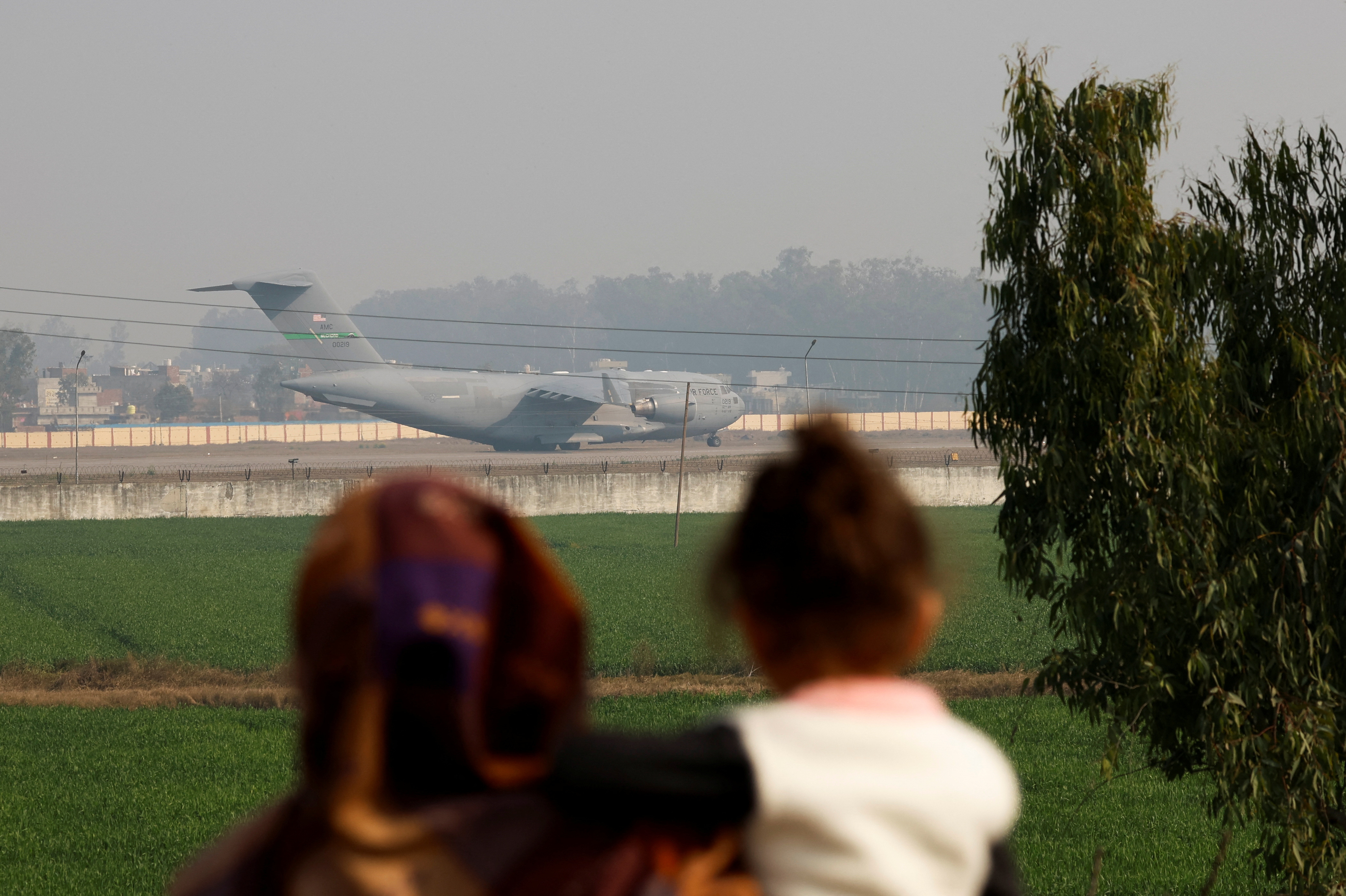 US military plane flies 104 illegal immigrants back to India