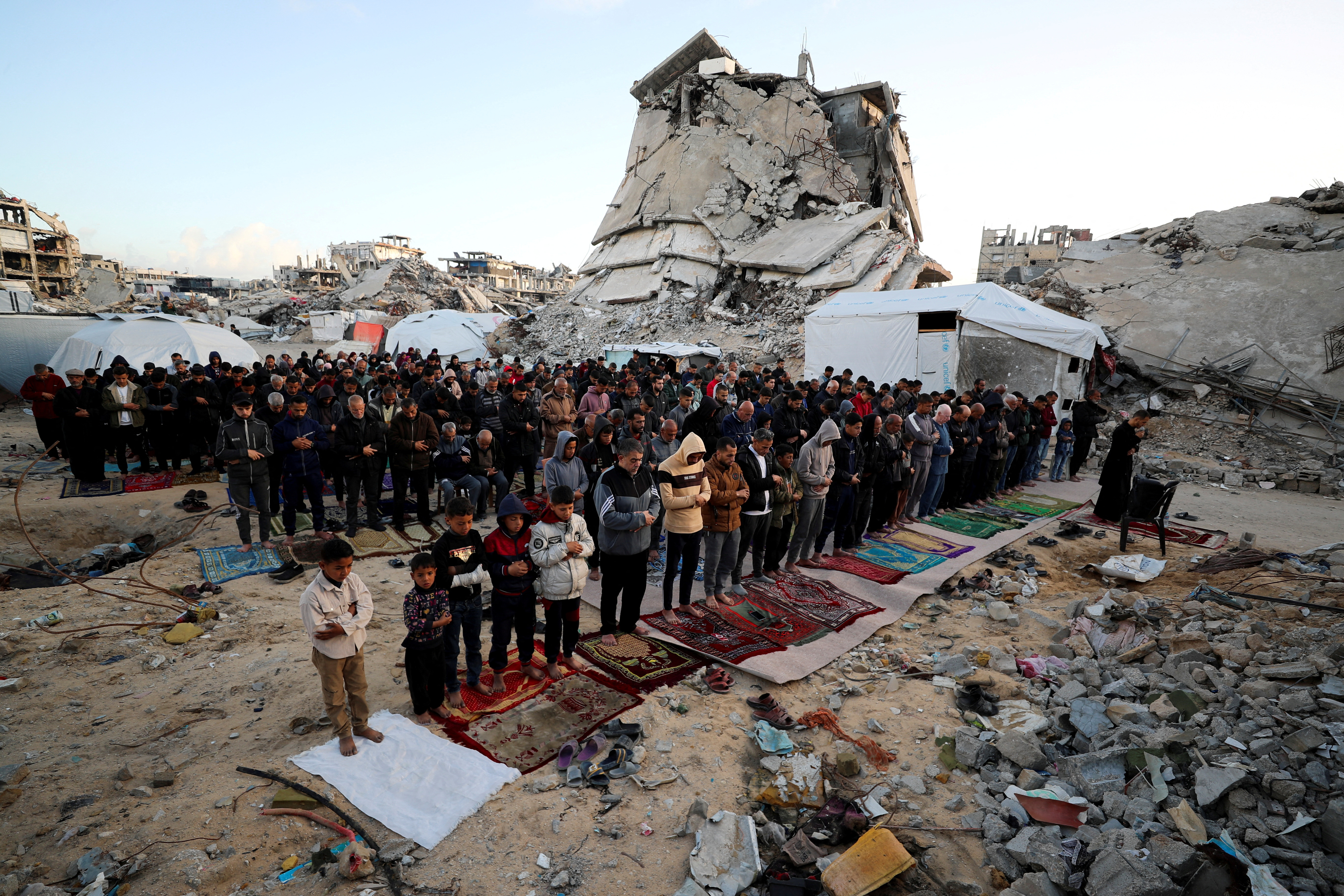 Palestinians celebrate Eid among Gaza's smoke, ruins
