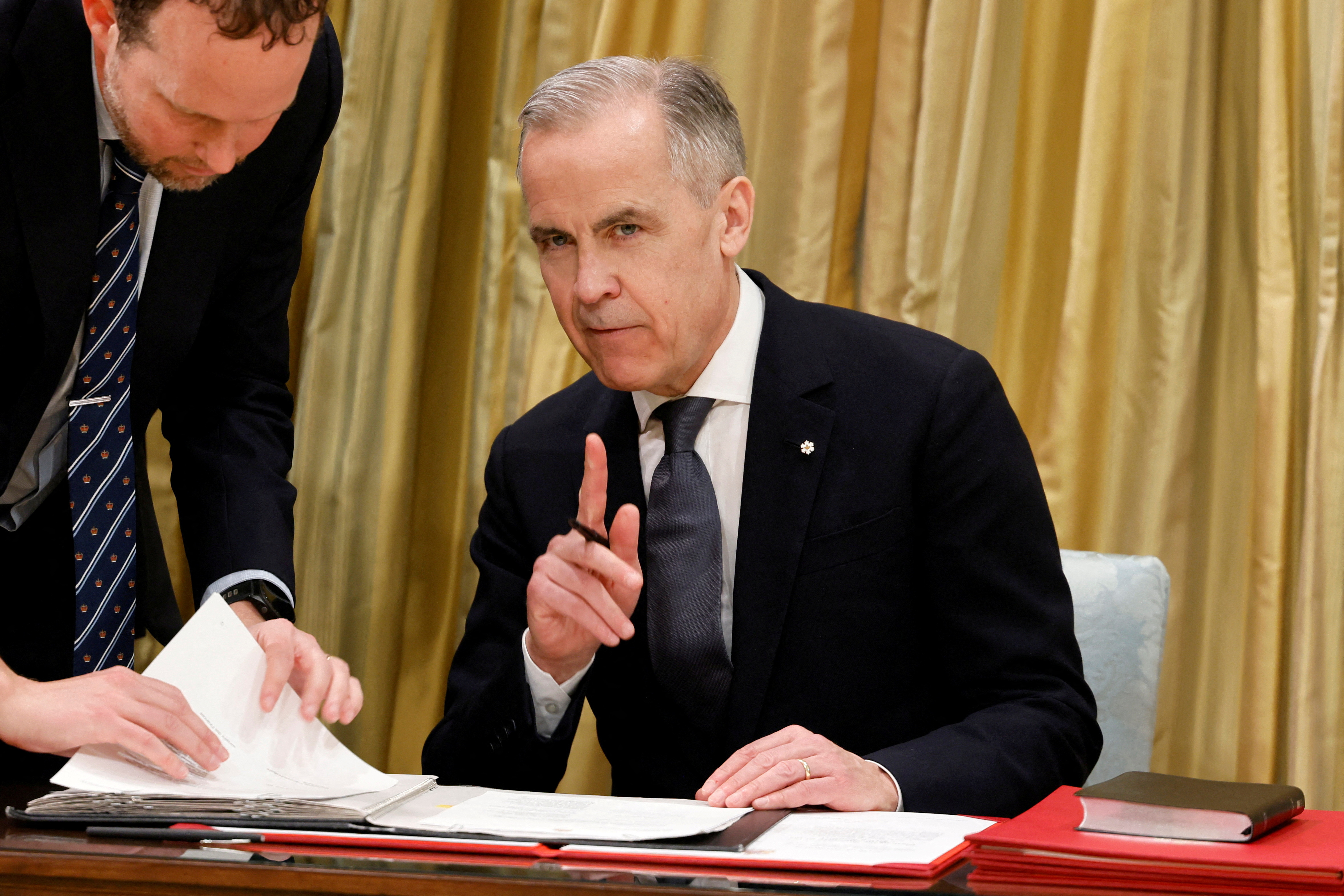 Mark Carney sworn in as Canada’s prime minister, says he can work with Trump