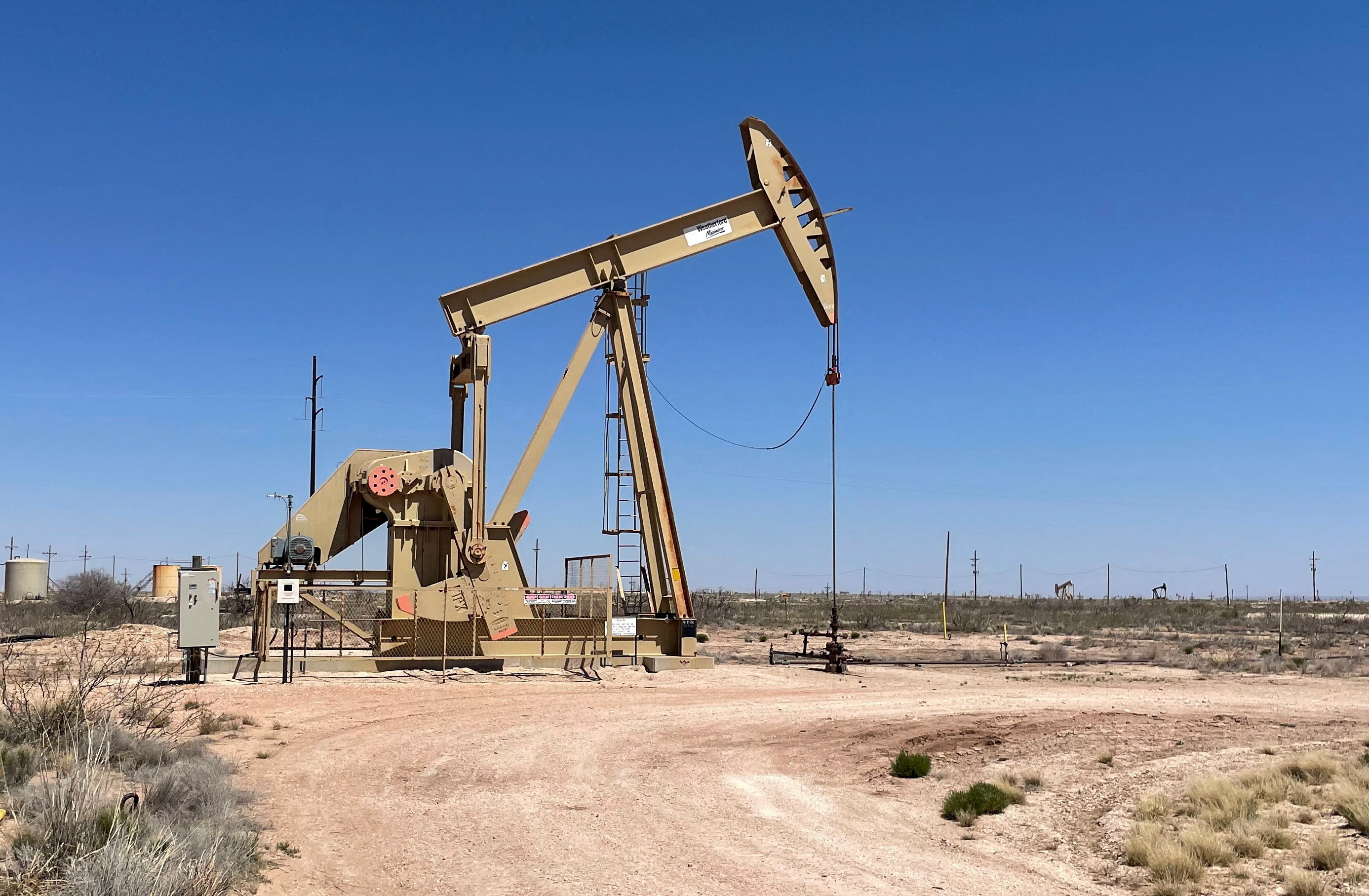 Oil near three-week high on supply fears, US stocks drop